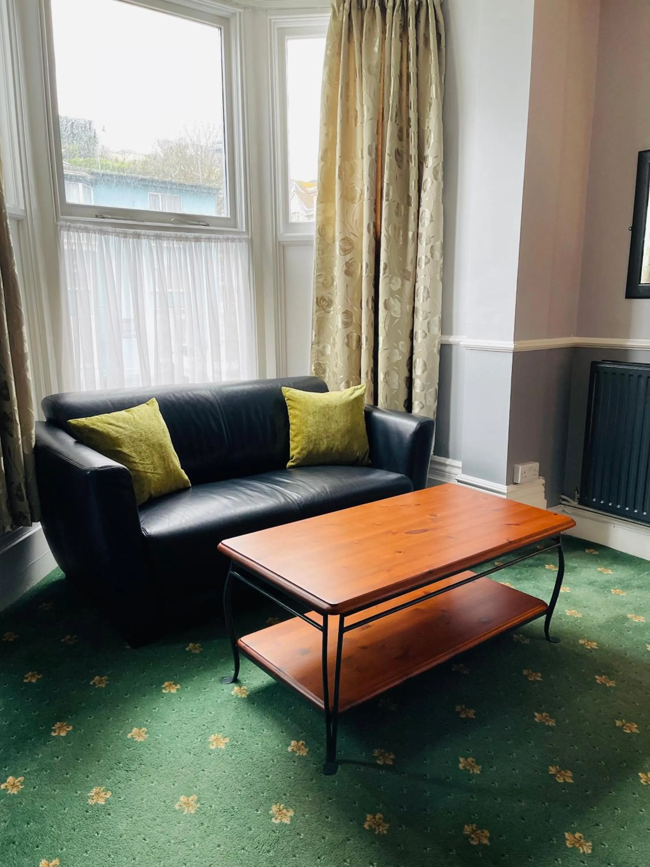 Seating area in Palm Court B&B
