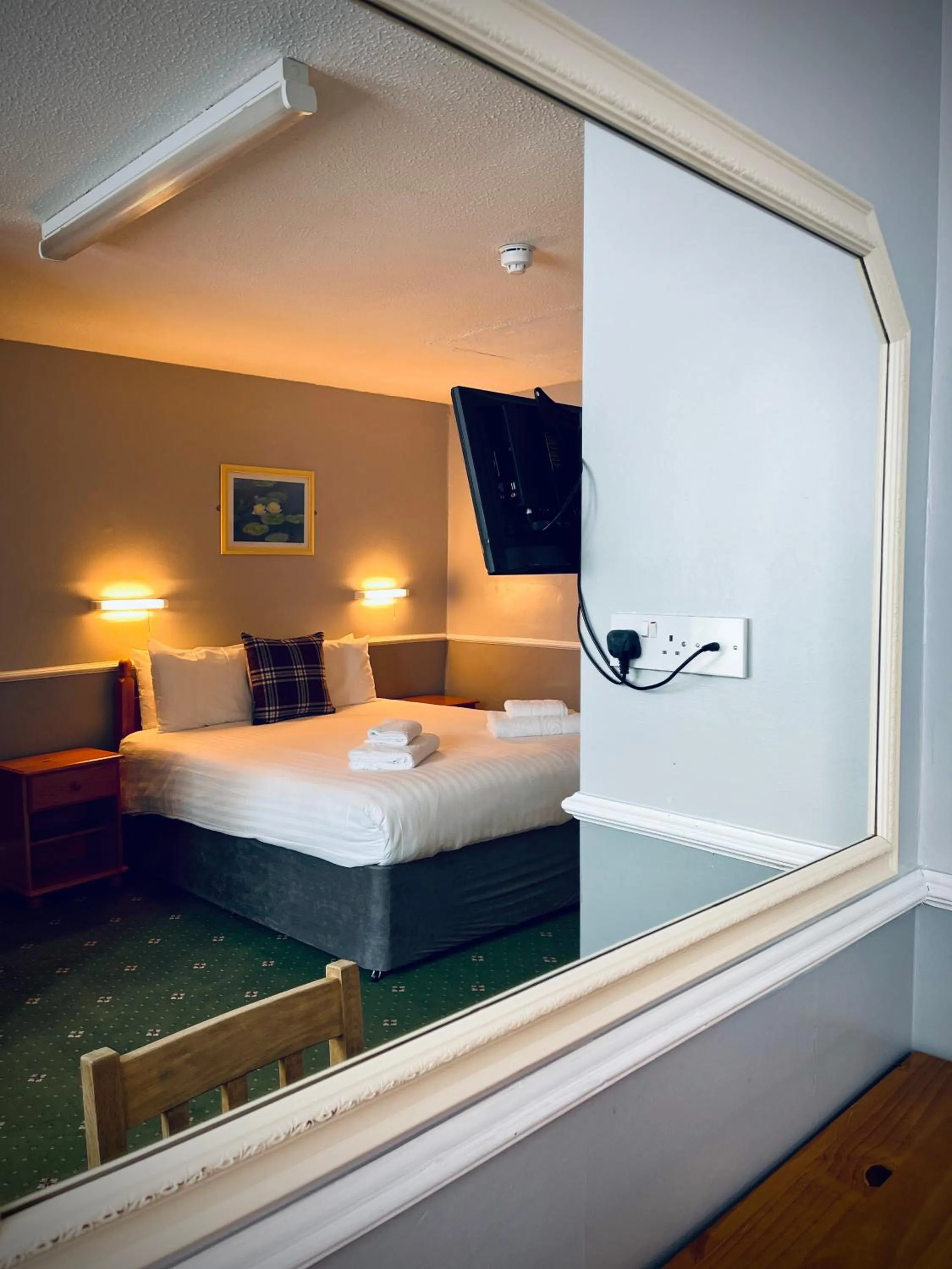 Bed in Palm Court B&B