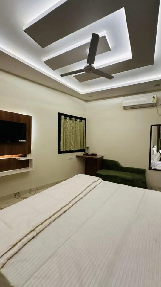 Bed in Hotel Ratnam Palace Maheshwar