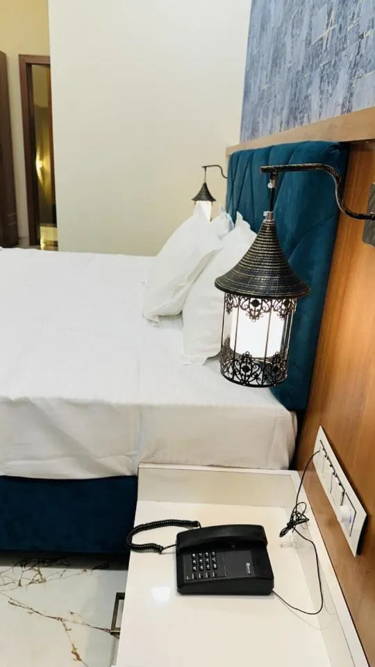 Bed in Hotel Ratnam Palace Maheshwar