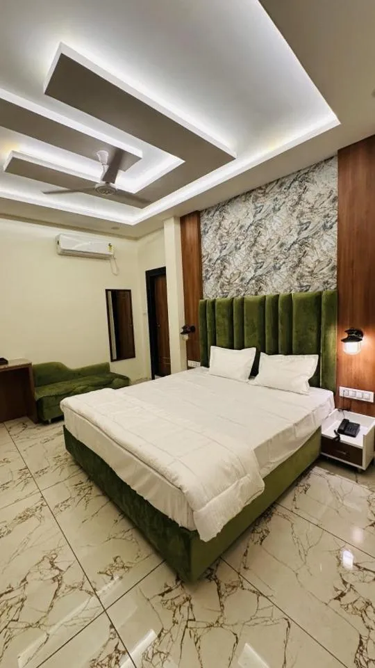 Bed in Hotel Ratnam Palace Maheshwar