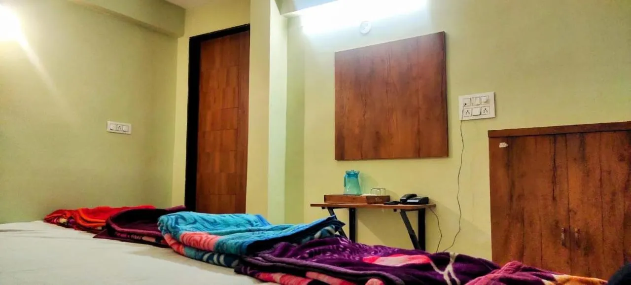 Bed in Hotel Ratnam Palace Maheshwar