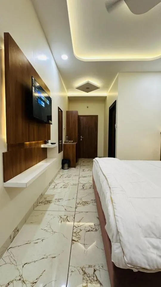 Bed in Hotel Ratnam Palace Maheshwar