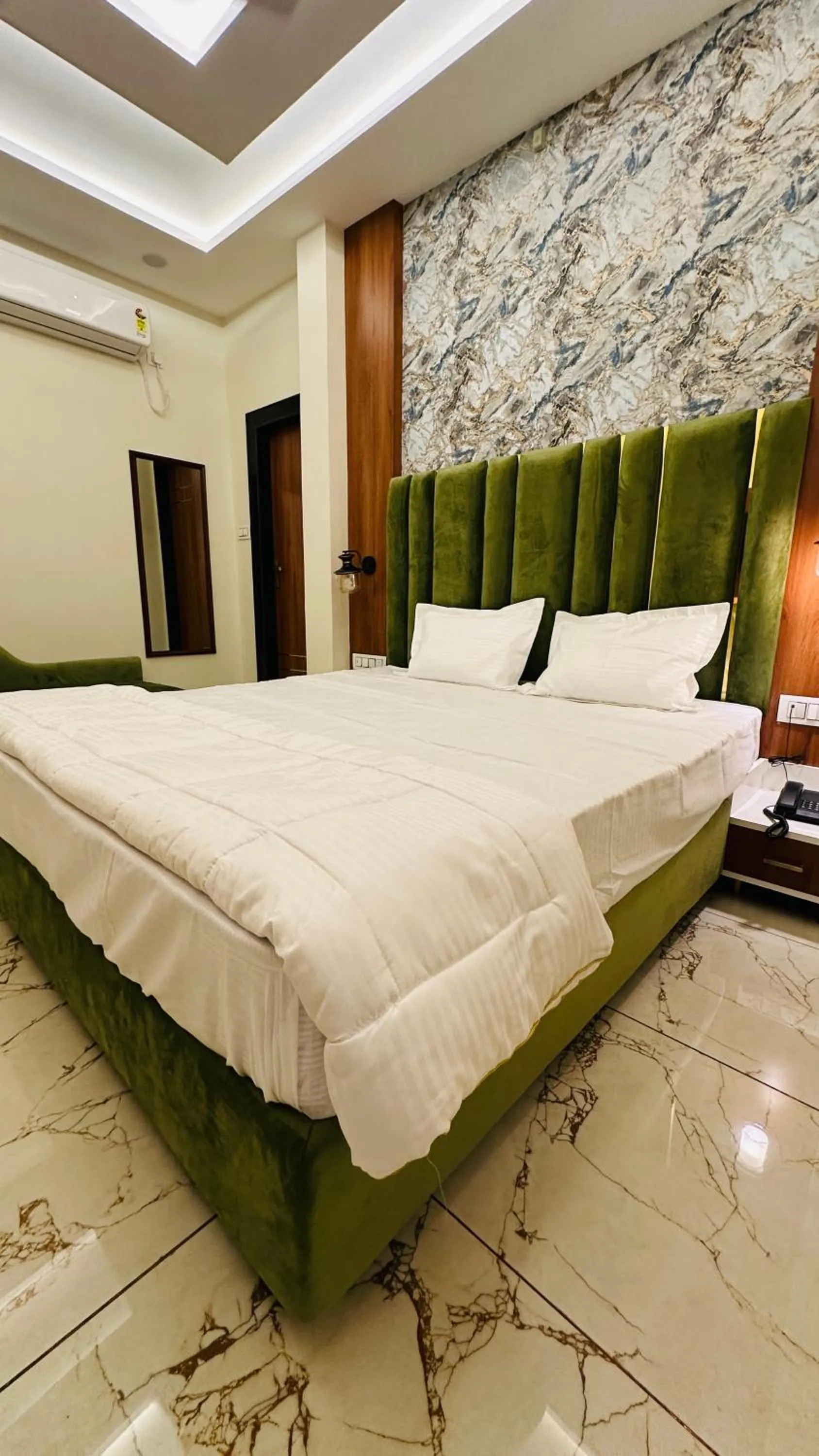 Bed in Hotel Ratnam Palace Maheshwar