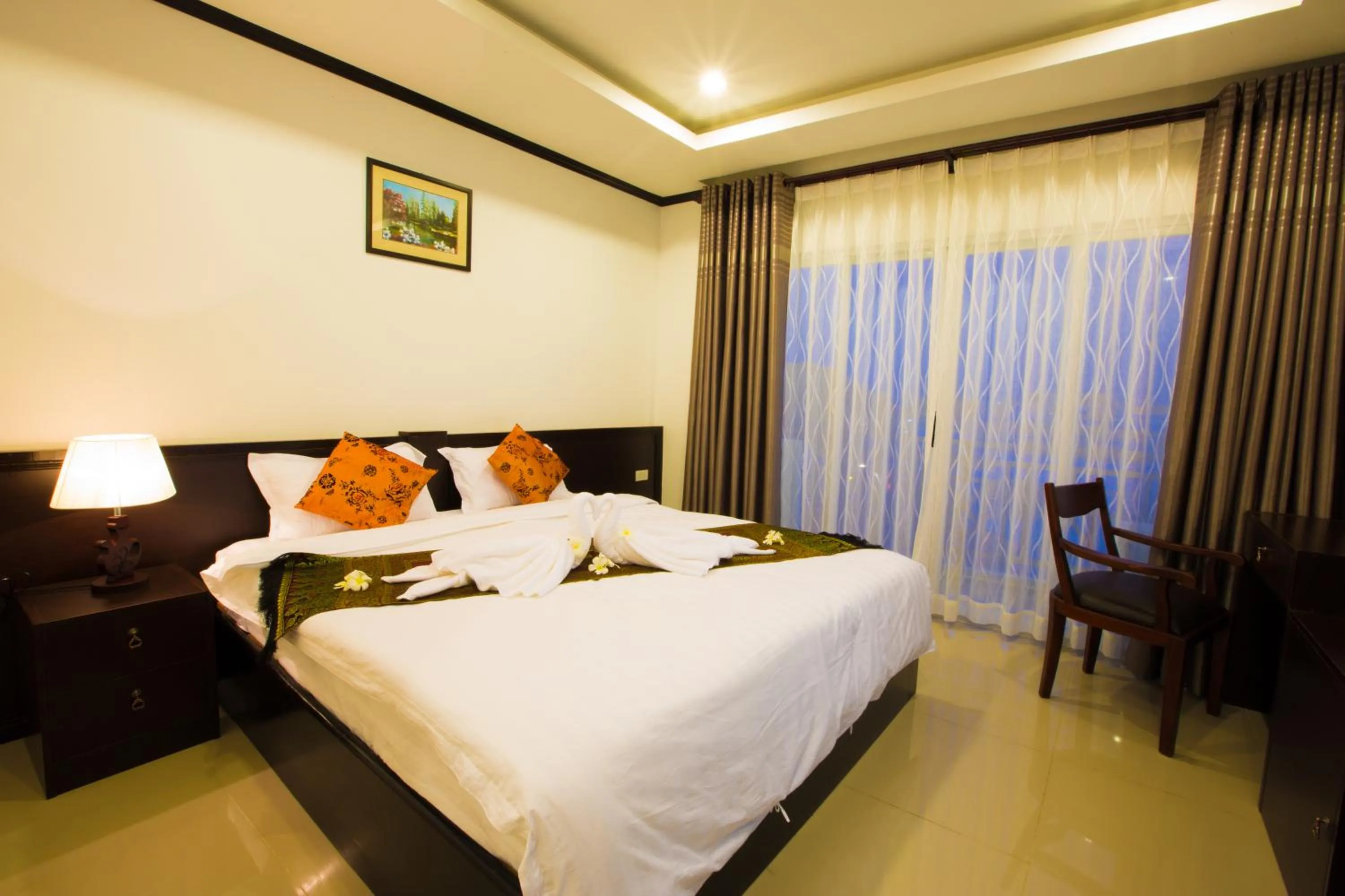 Photo of the whole room, Bed in Douangchan Plaza Hotel