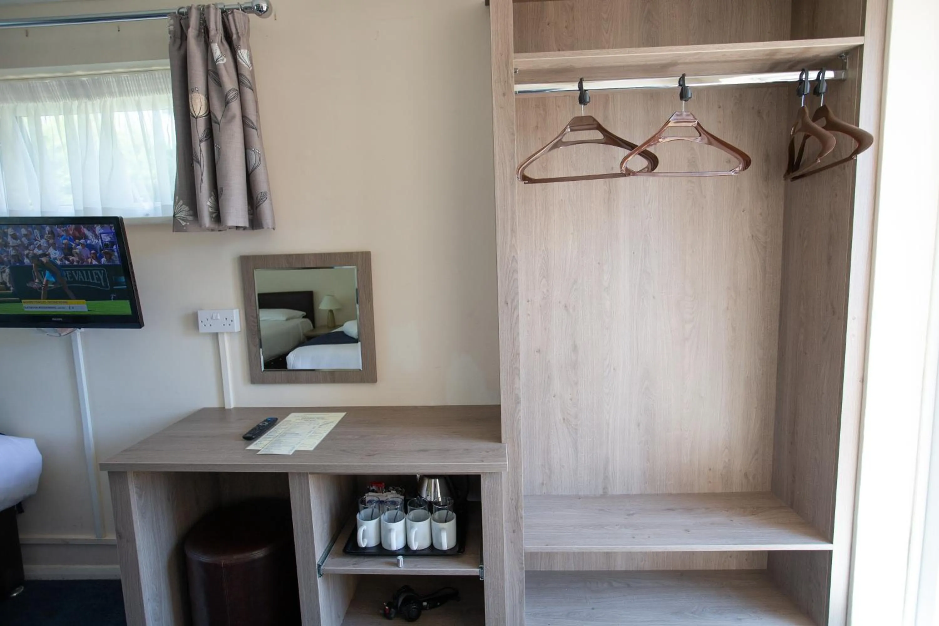 Bedroom in Corner House Hotel Gatwick with bookable Holiday parking