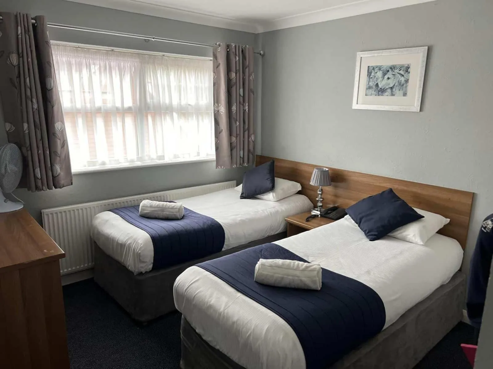Bed in Corner House Hotel Gatwick with bookable Holiday parking