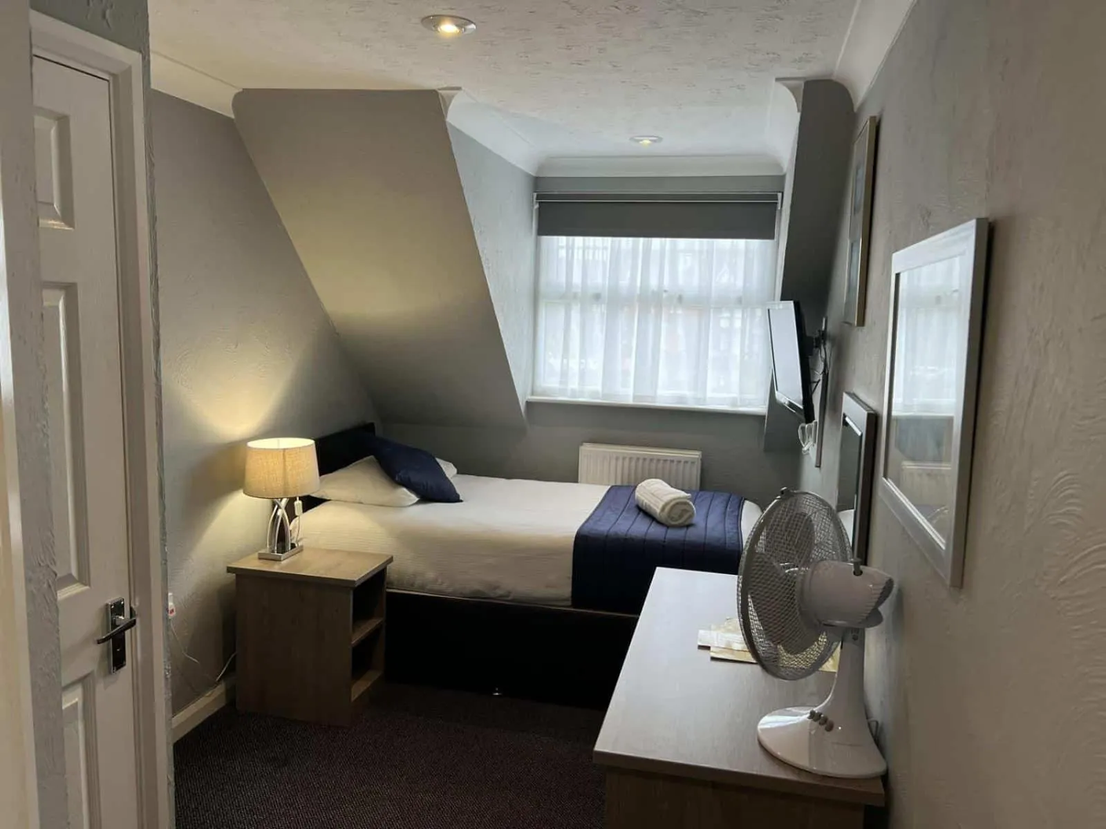 Bed in Corner House Hotel Gatwick with bookable Holiday parking