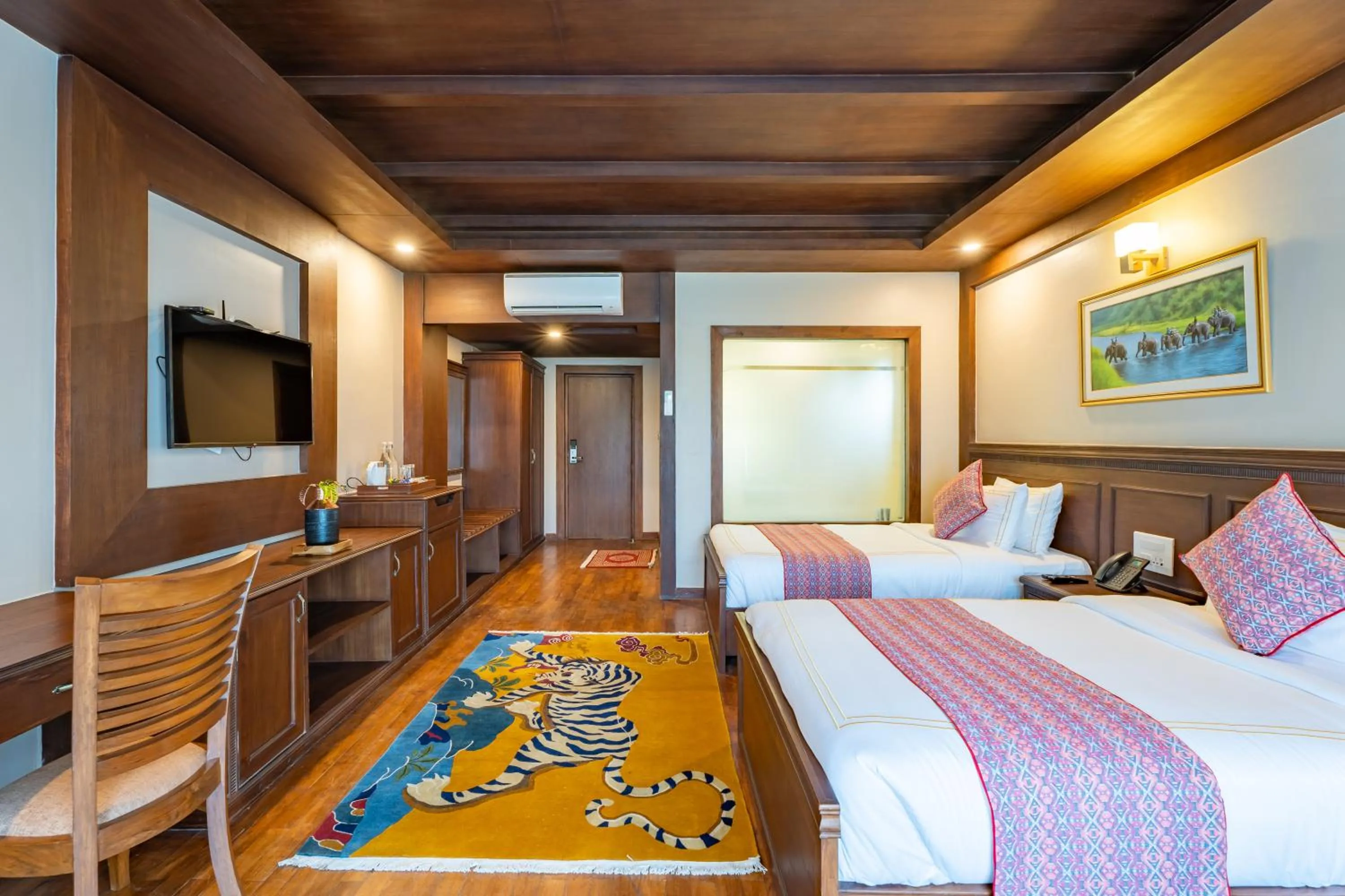 Bed in River Bank Jungle Resort, Chitwan