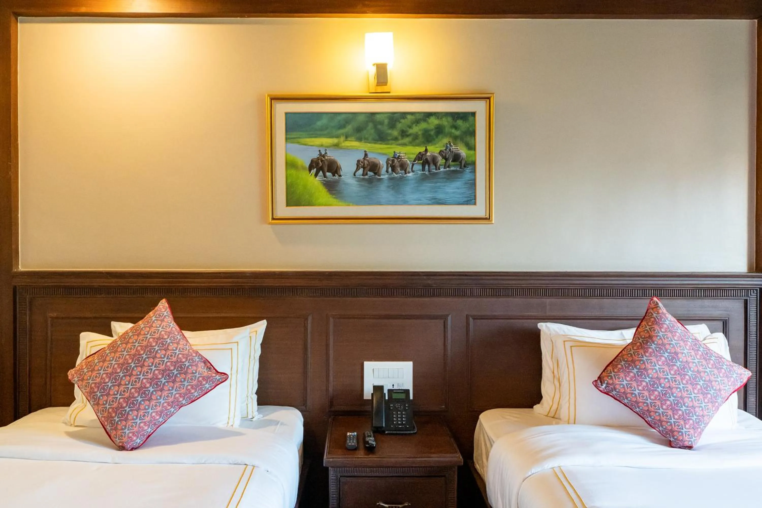 Bed in River Bank Jungle Resort, Chitwan