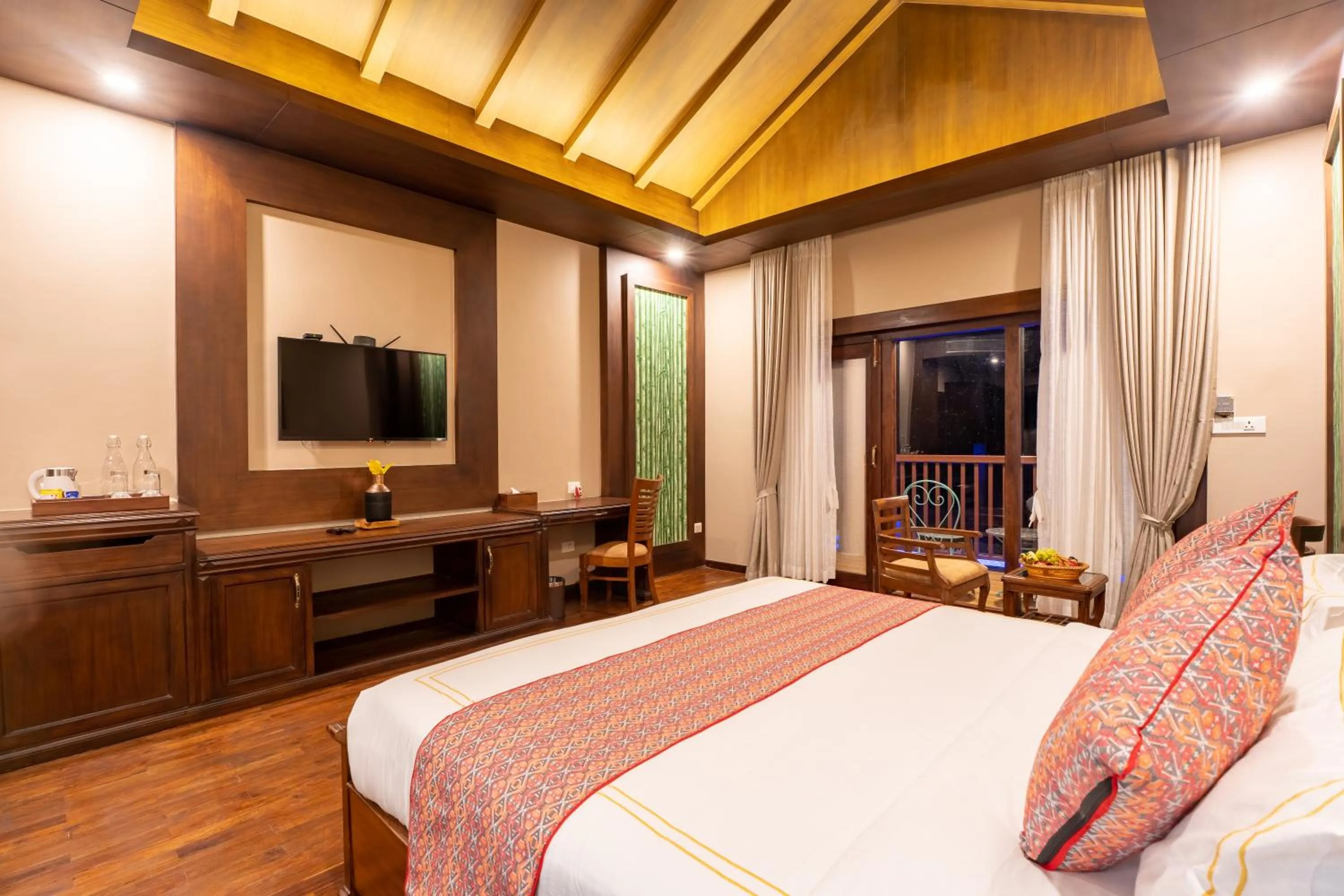 Bed in River Bank Jungle Resort, Chitwan