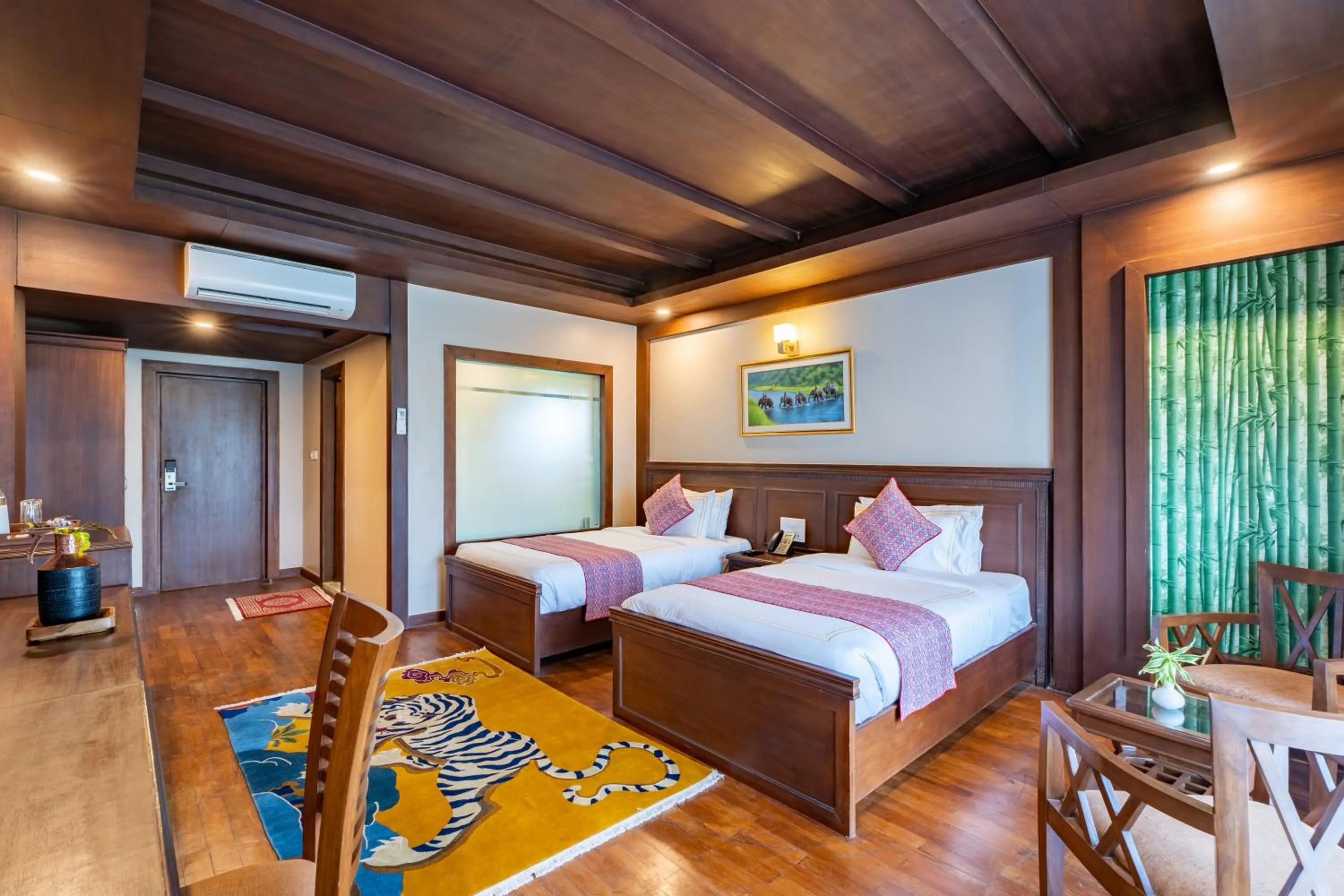 Bed in River Bank Jungle Resort, Chitwan