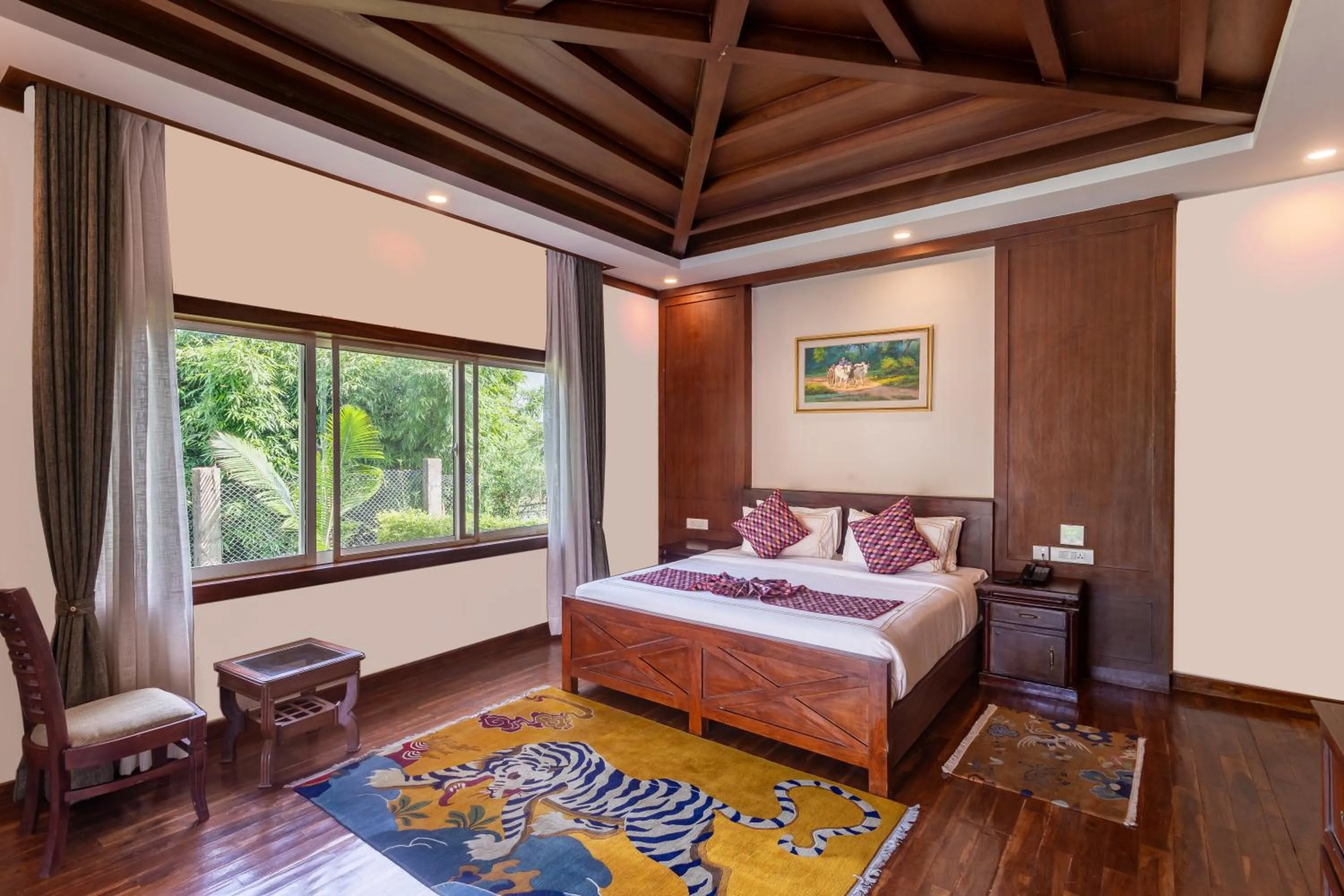 Bed in River Bank Jungle Resort, Chitwan
