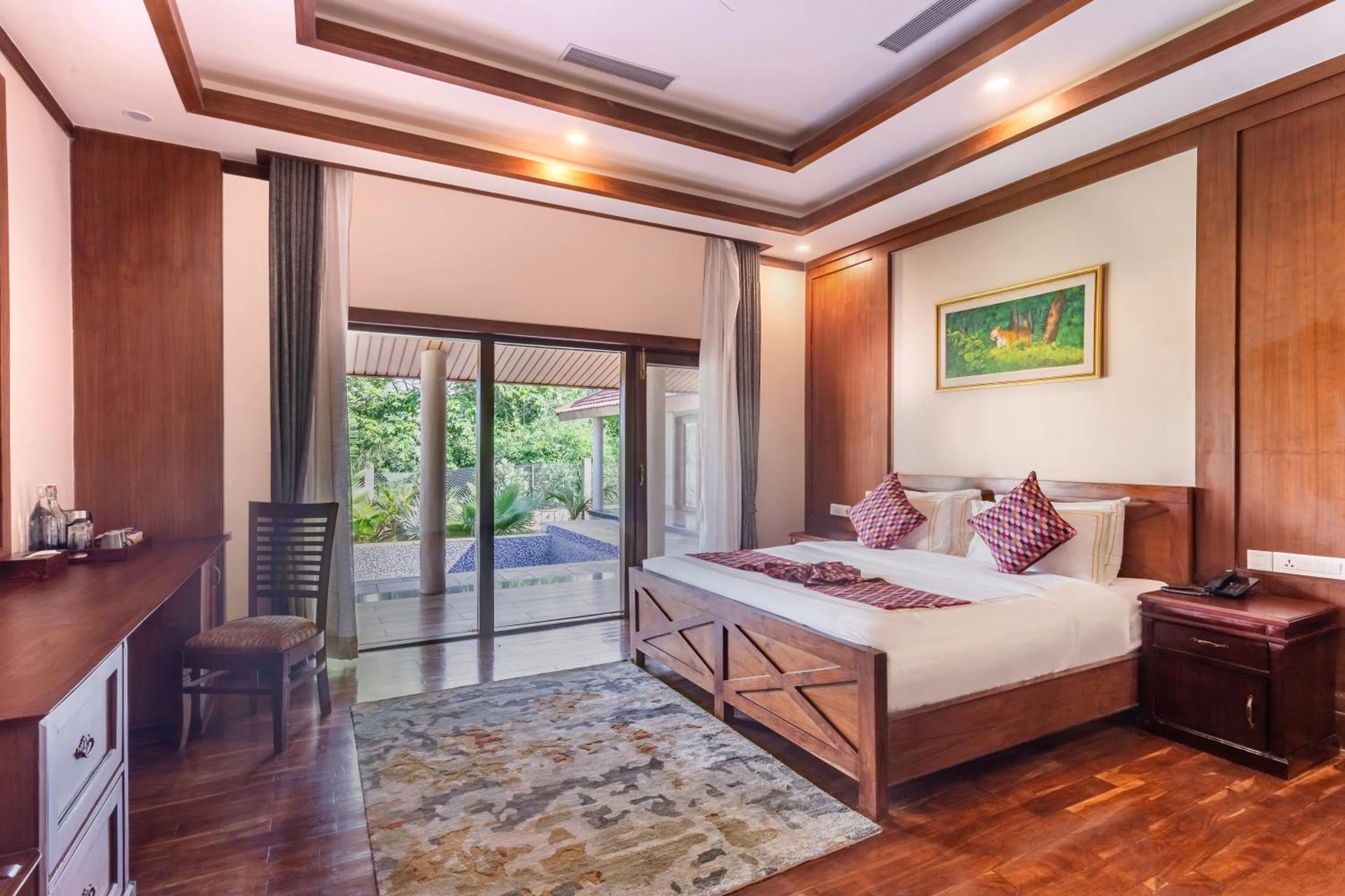 Bed in River Bank Jungle Resort, Chitwan