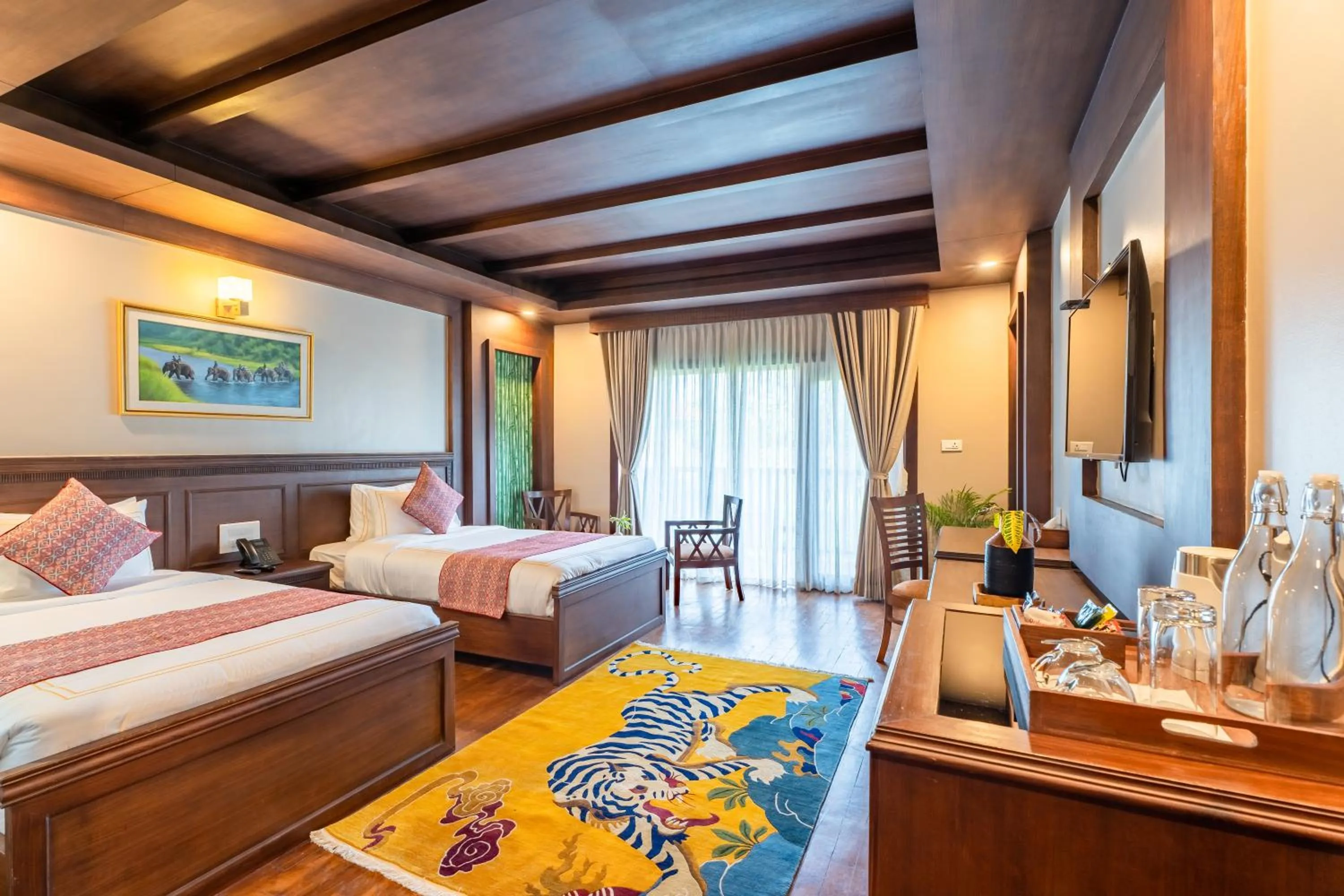 Bed in River Bank Jungle Resort, Chitwan