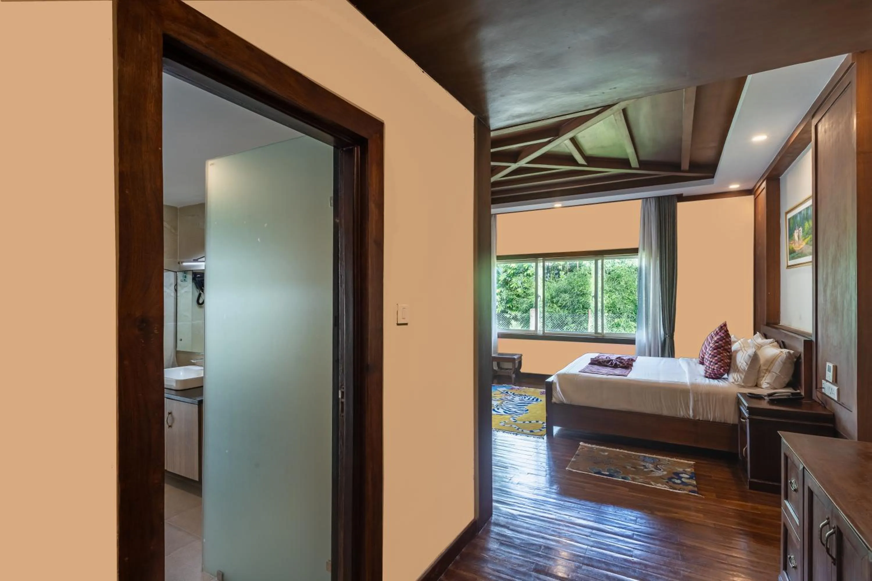 Bed in River Bank Jungle Resort, Chitwan