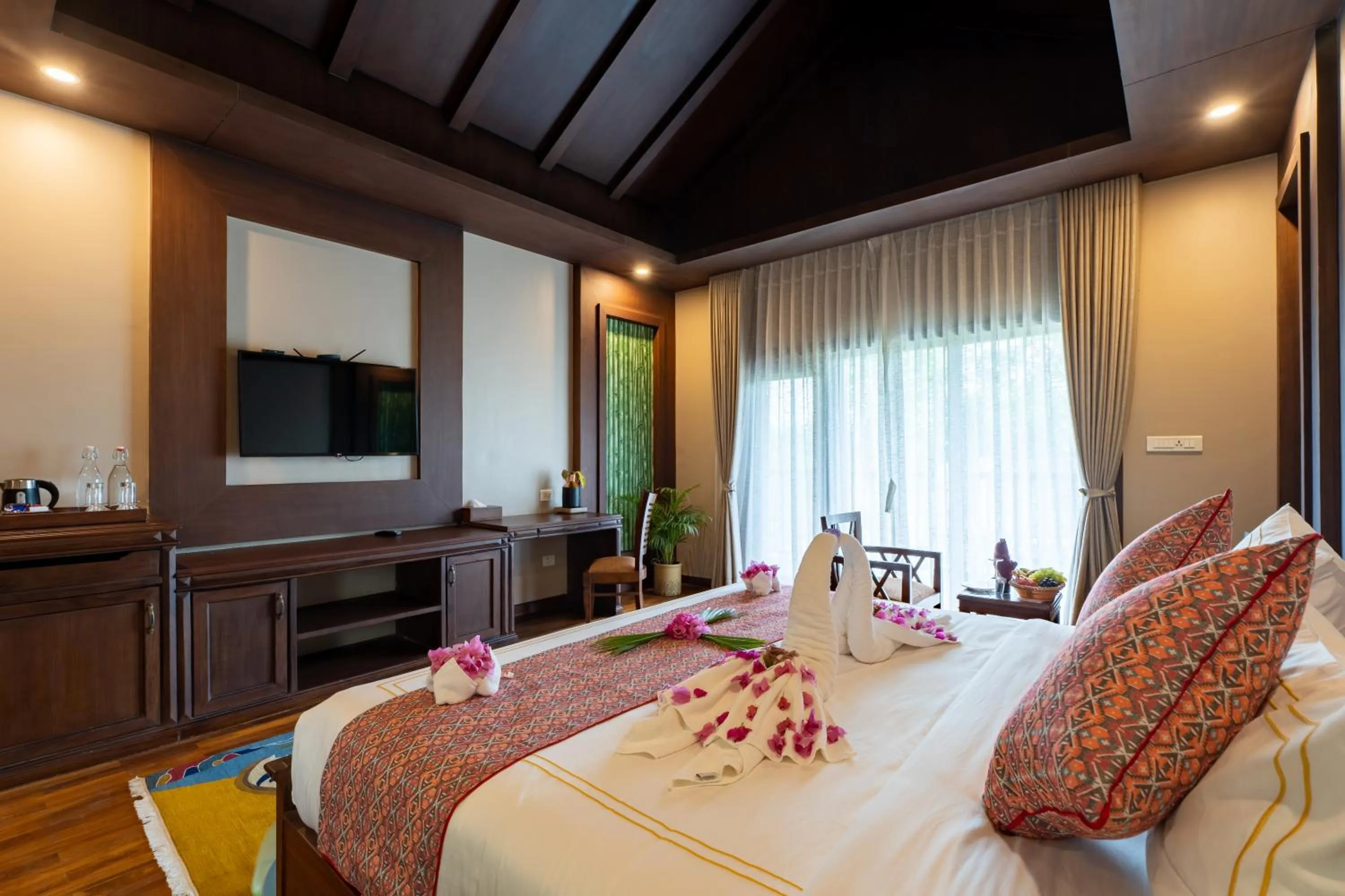 Bed in River Bank Jungle Resort, Chitwan