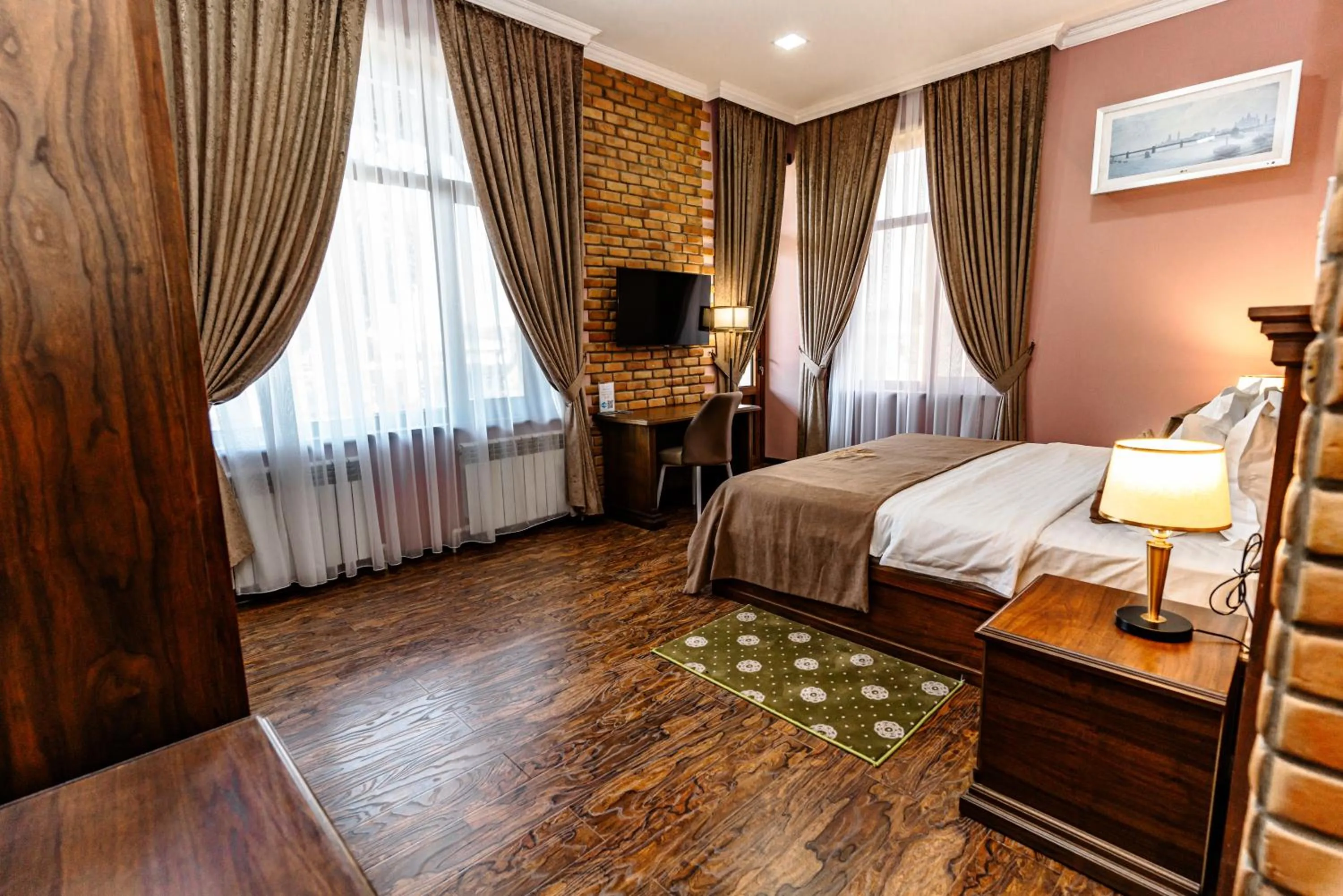 Communal lounge/ TV room, Bed in Bagizagan Hotel