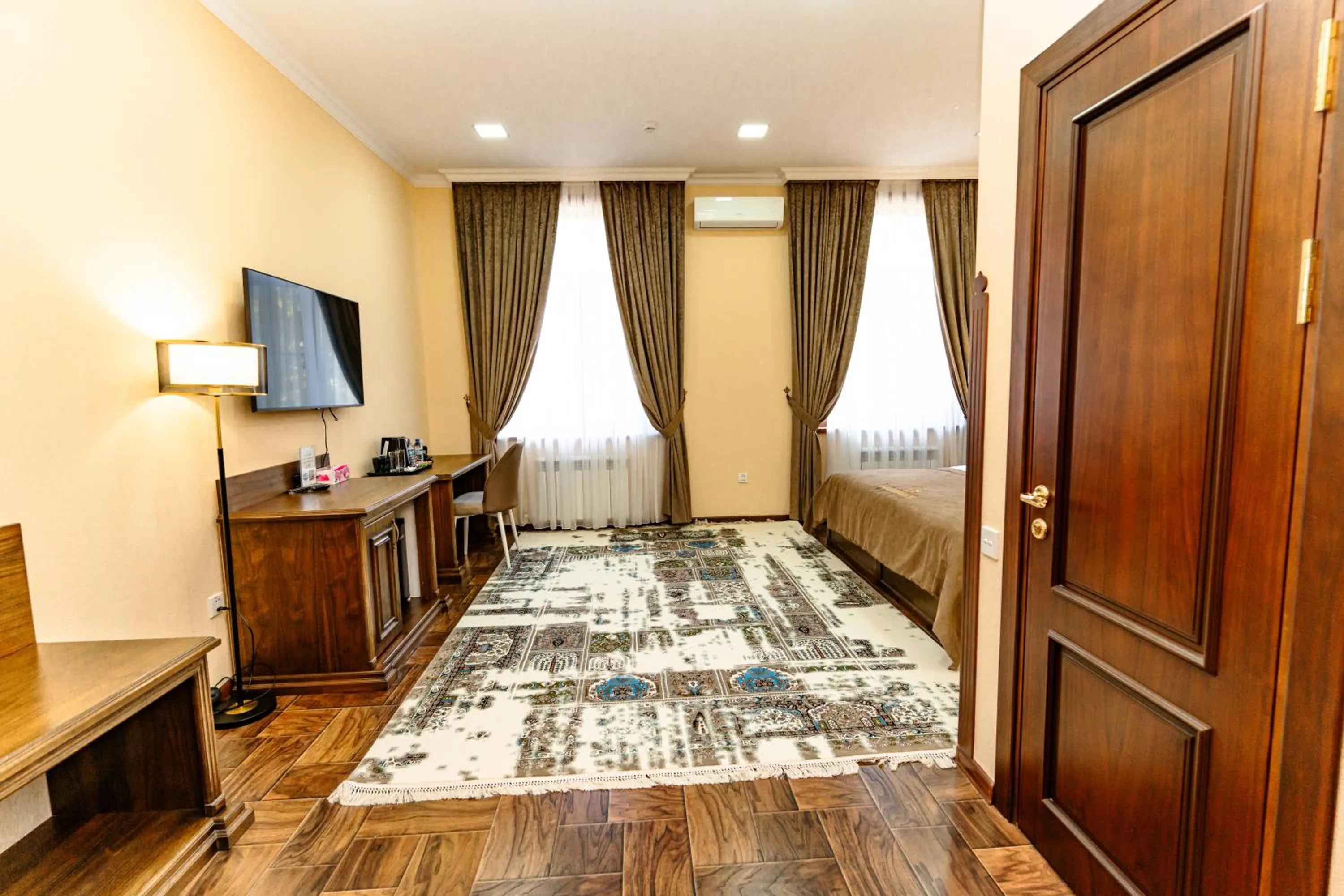 Communal lounge/ TV room, Bed in Bagizagan Hotel