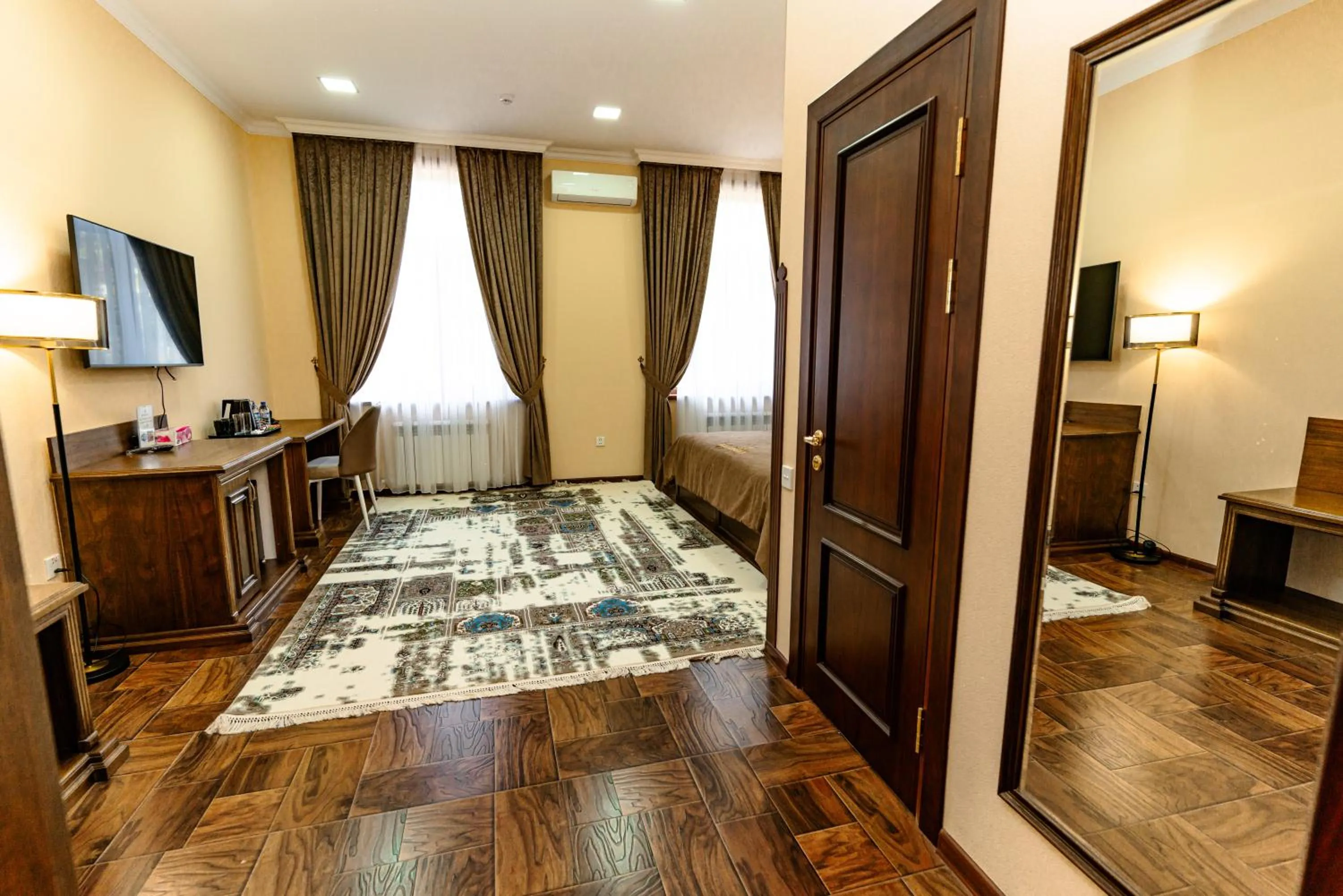 Communal lounge/ TV room, Bed in Bagizagan Hotel