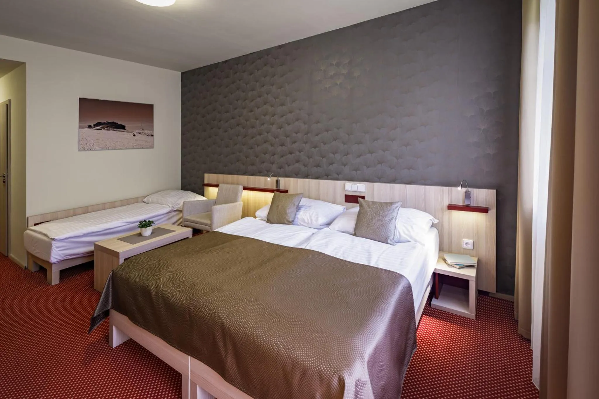 Bed in Peras Wellness Hotel