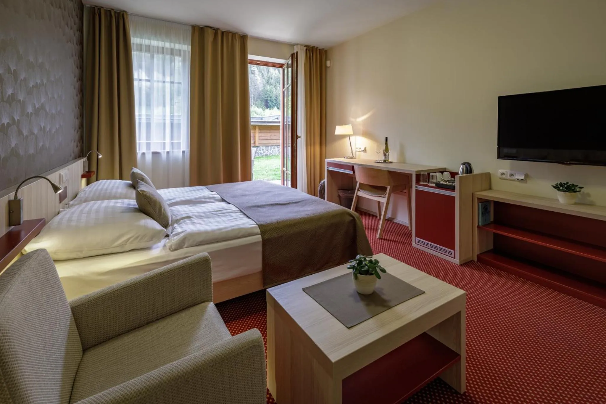 Bed in Peras Wellness Hotel