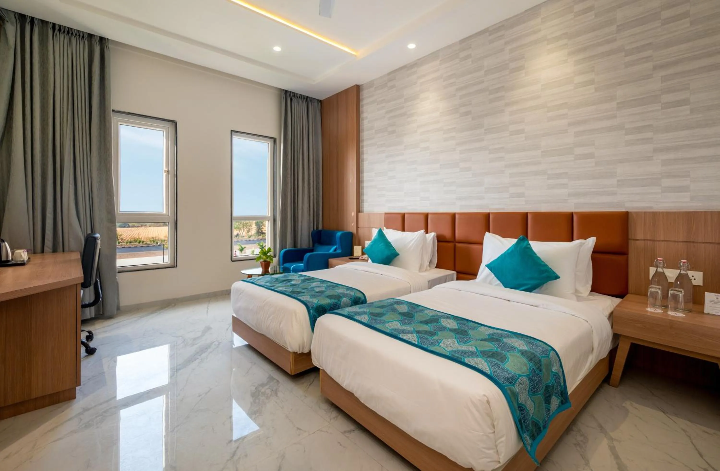 Photo of the whole room, Bed in The Orchid Jamnagar