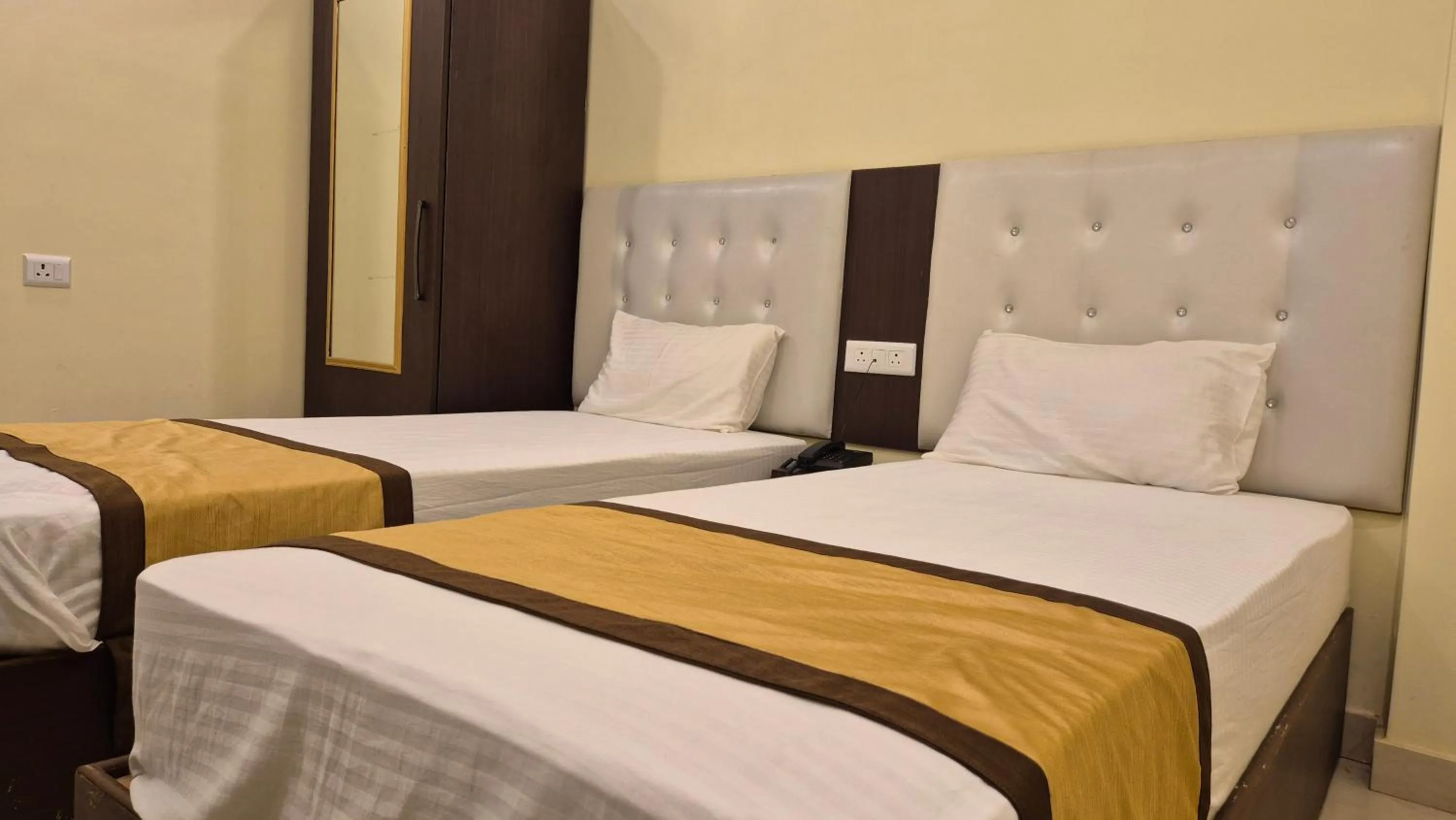 Bed in Royal View Residency