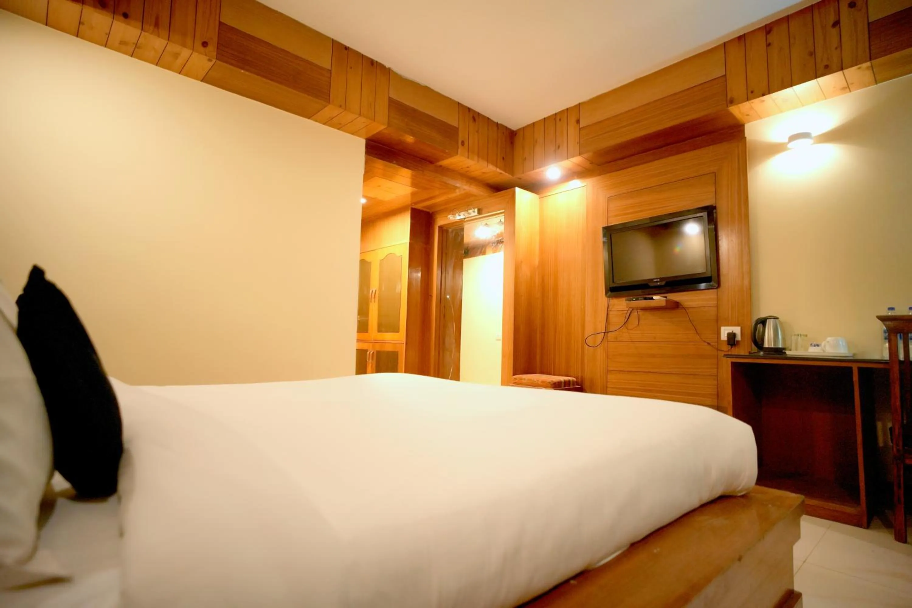 Bed in Shivalik Hotel And Resorts