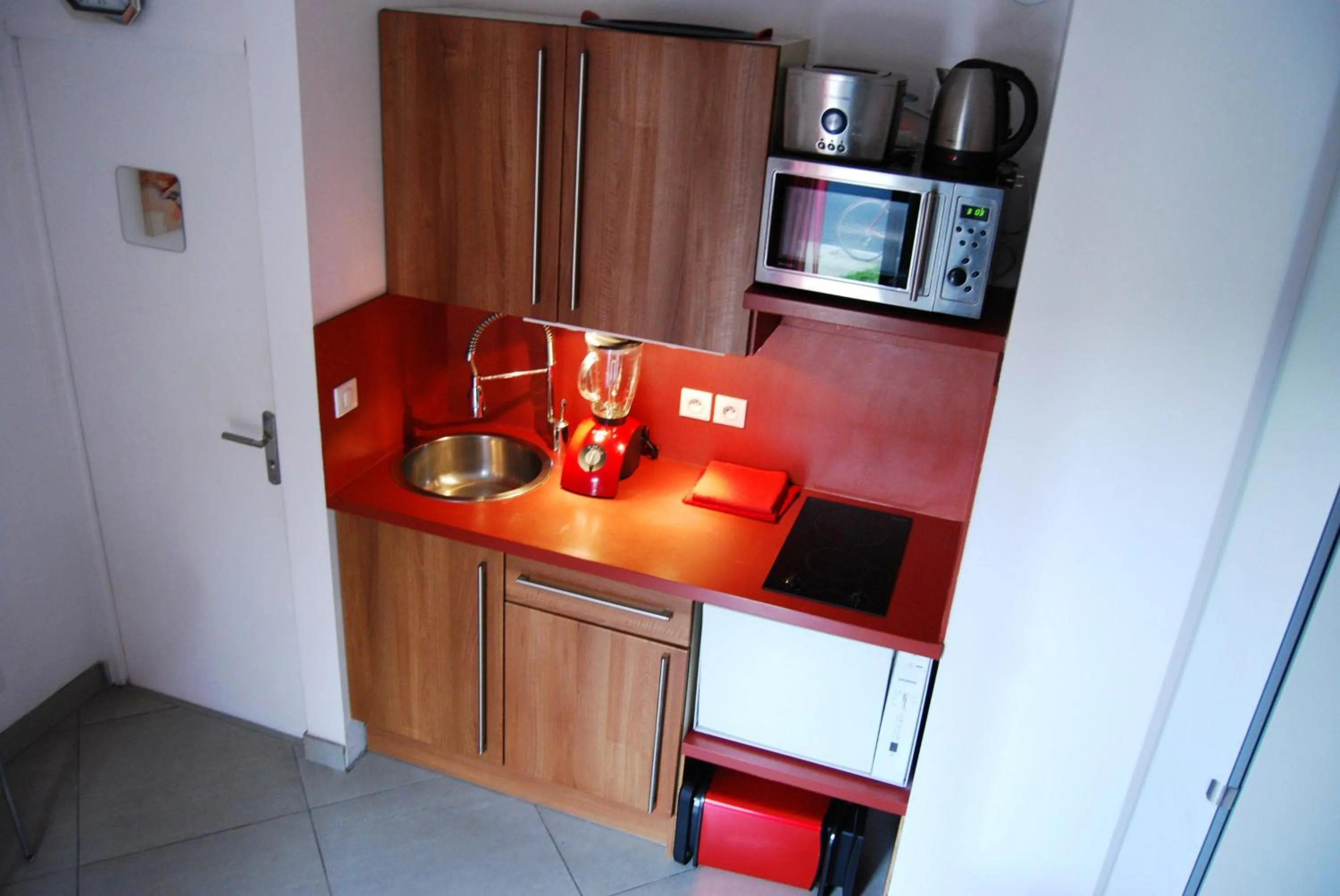 Kitchen or kitchenette in Pied à Terre en Ville