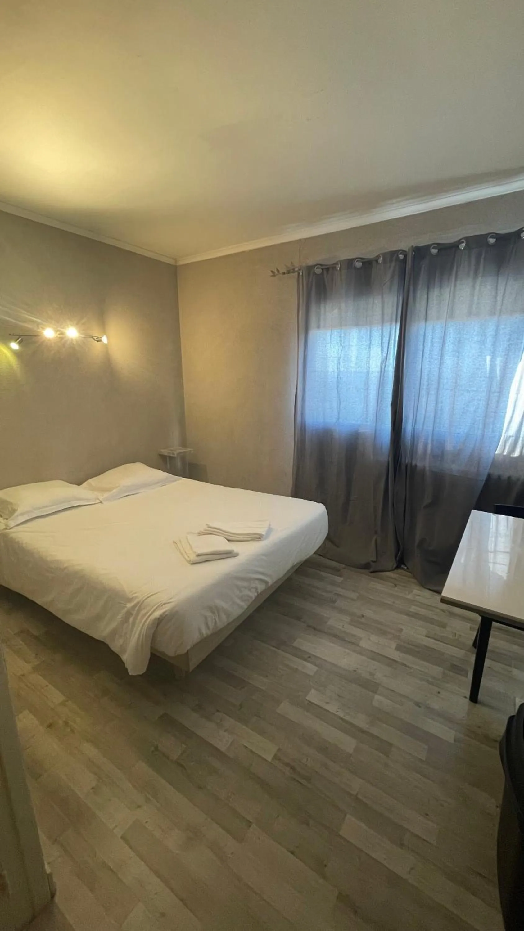 Bed in L'Excess Hotel