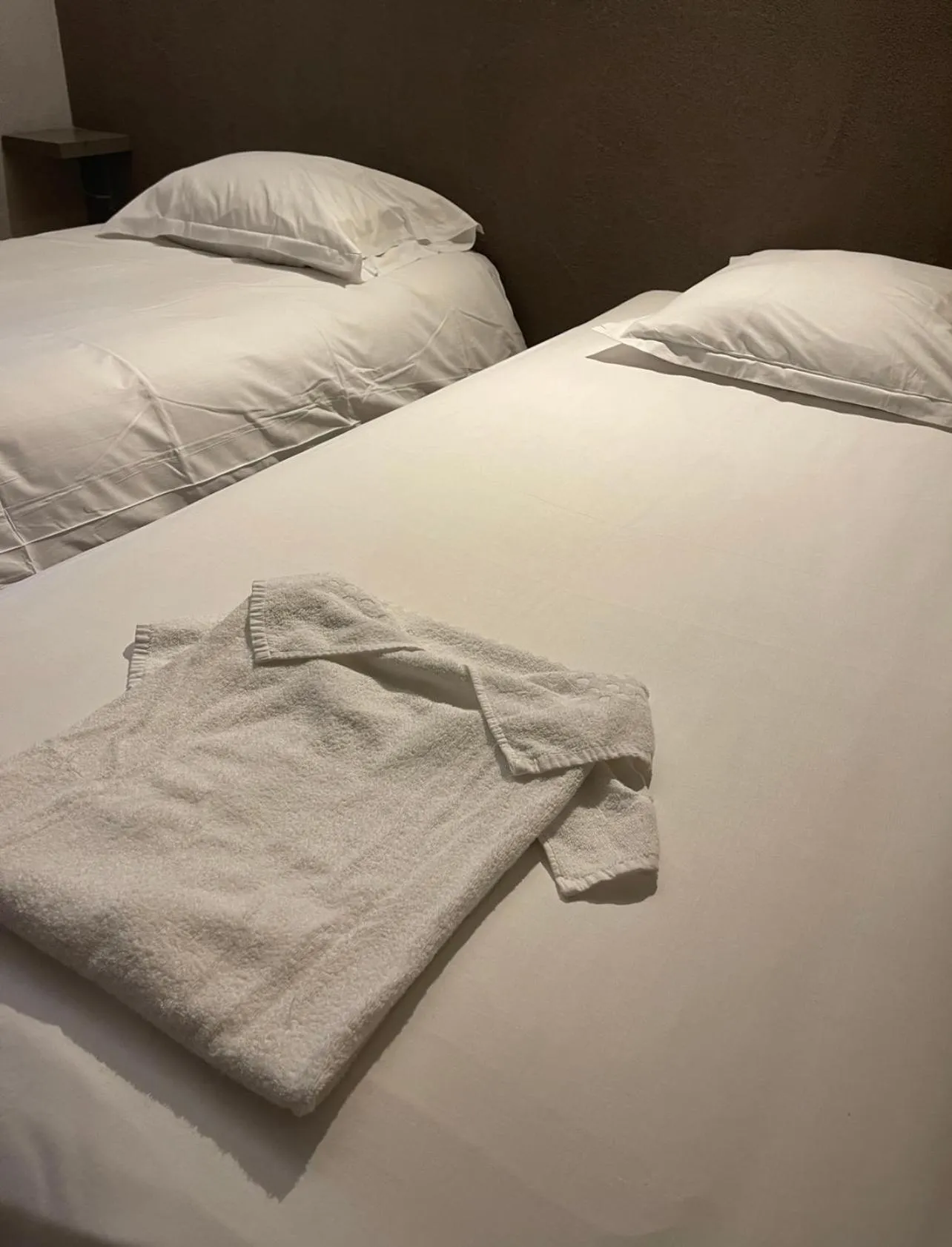 Bed in L'Excess Hotel