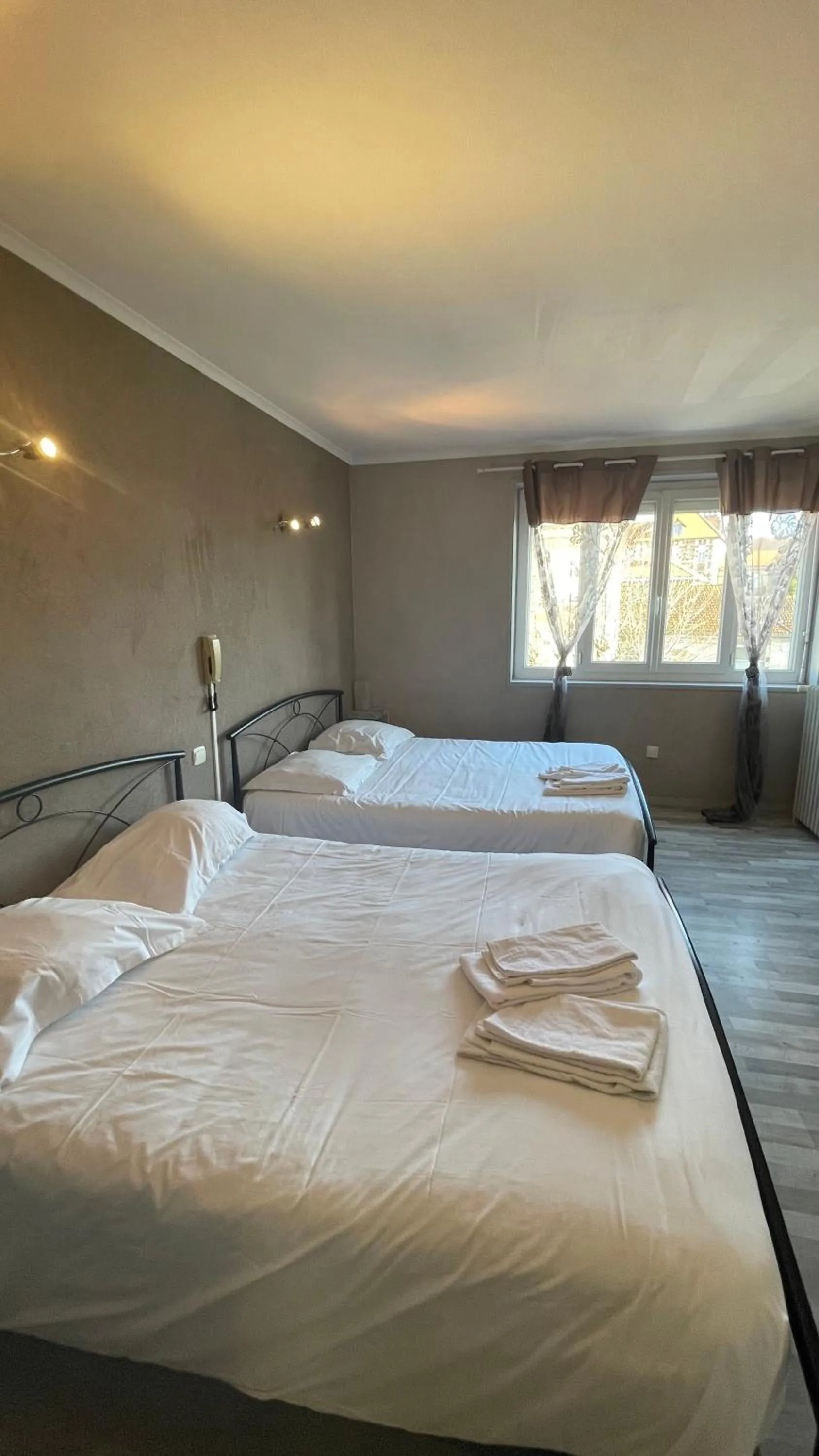 Bed in L'Excess Hotel