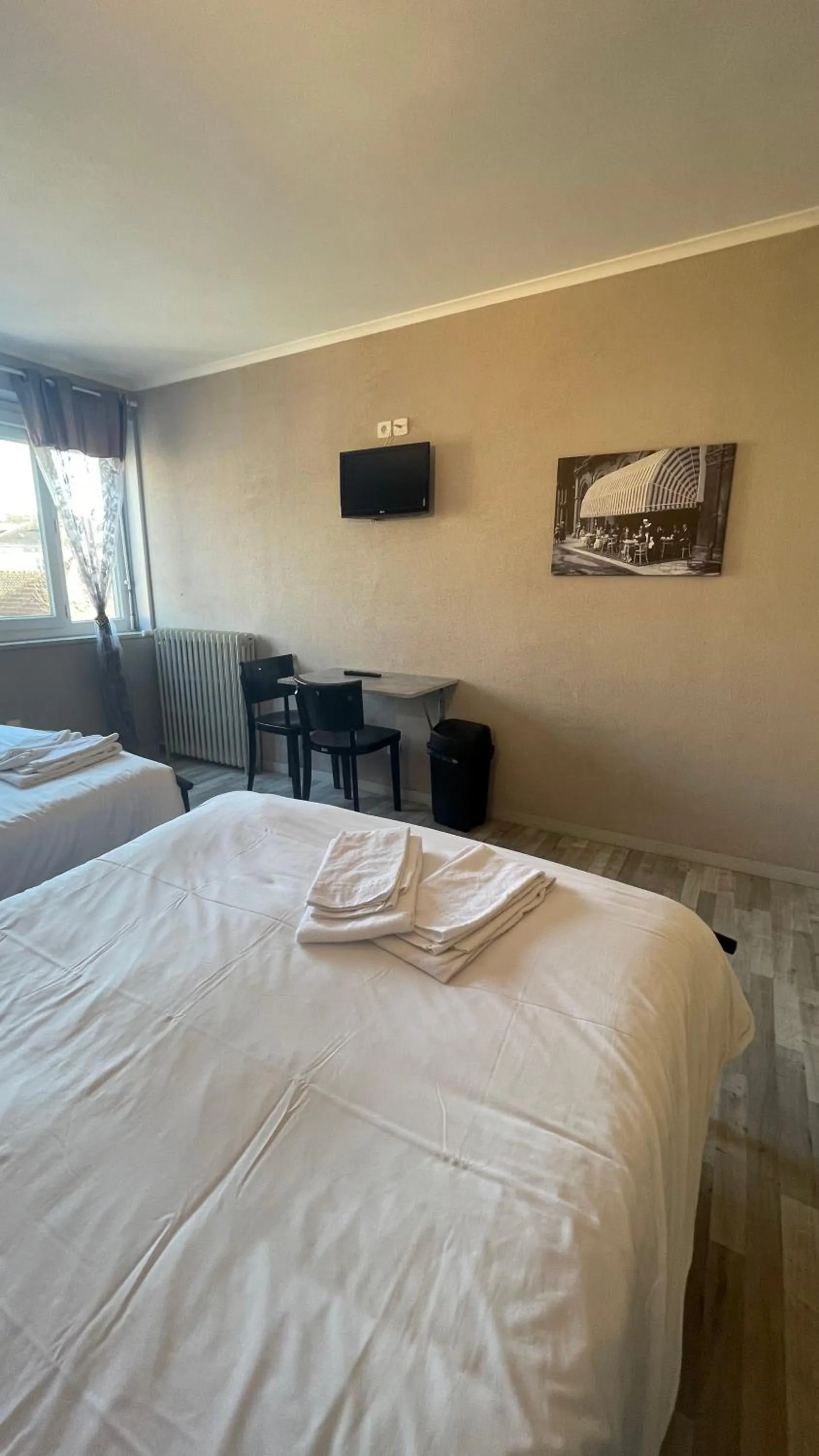 Bed in L'Excess Hotel