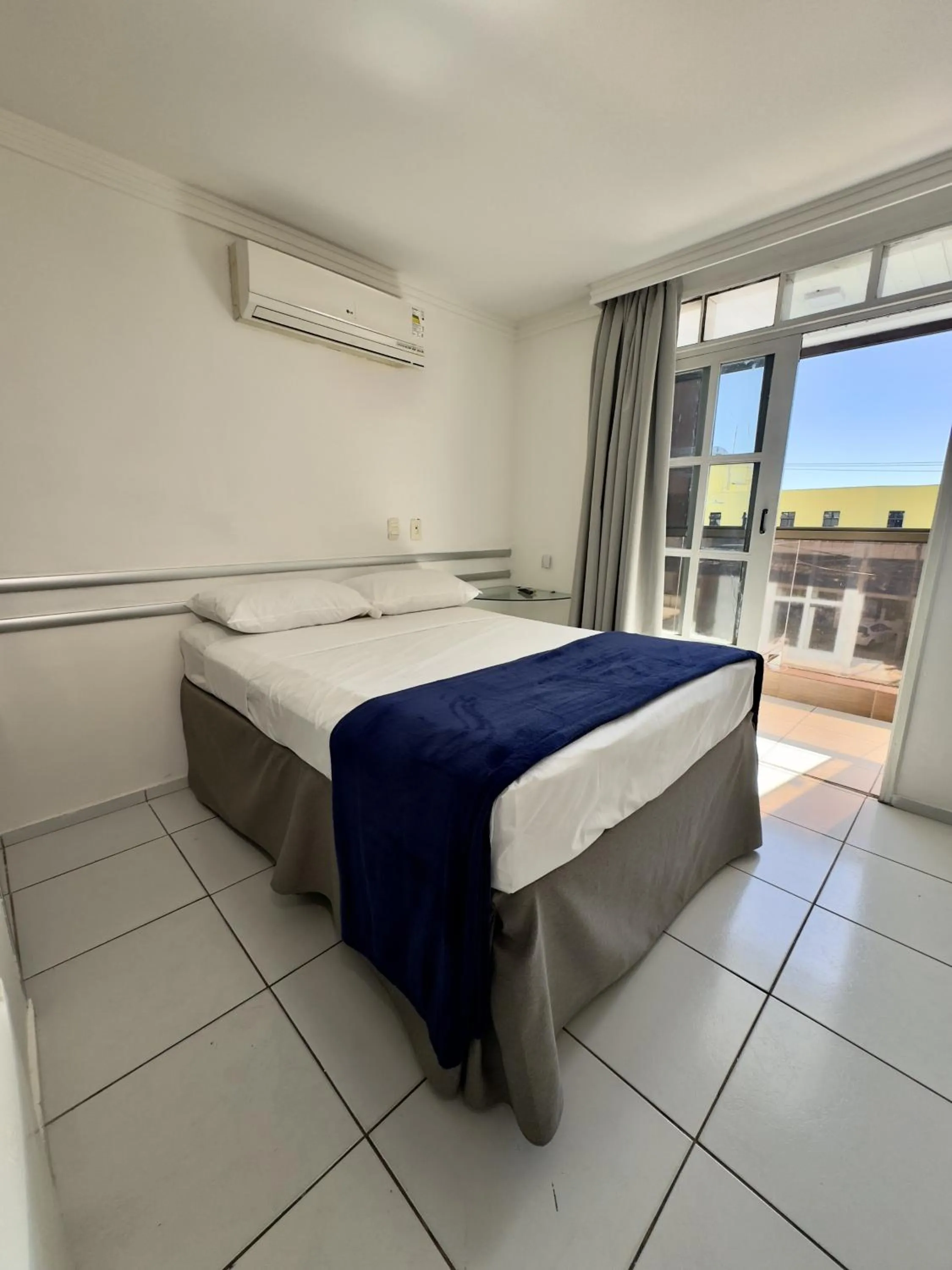 Bed in Las Brisas Beach Hotel