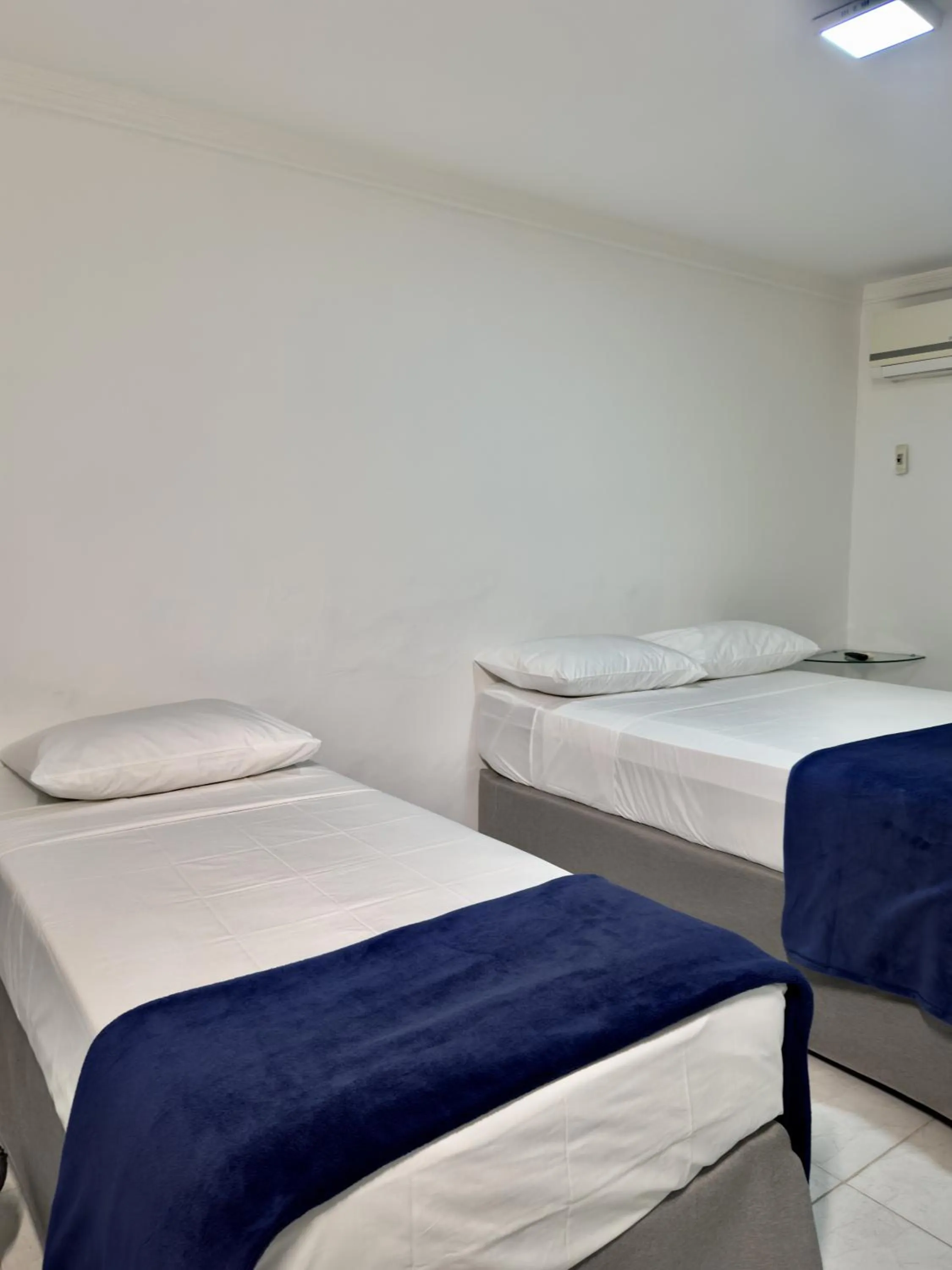 Bed in Las Brisas Beach Hotel