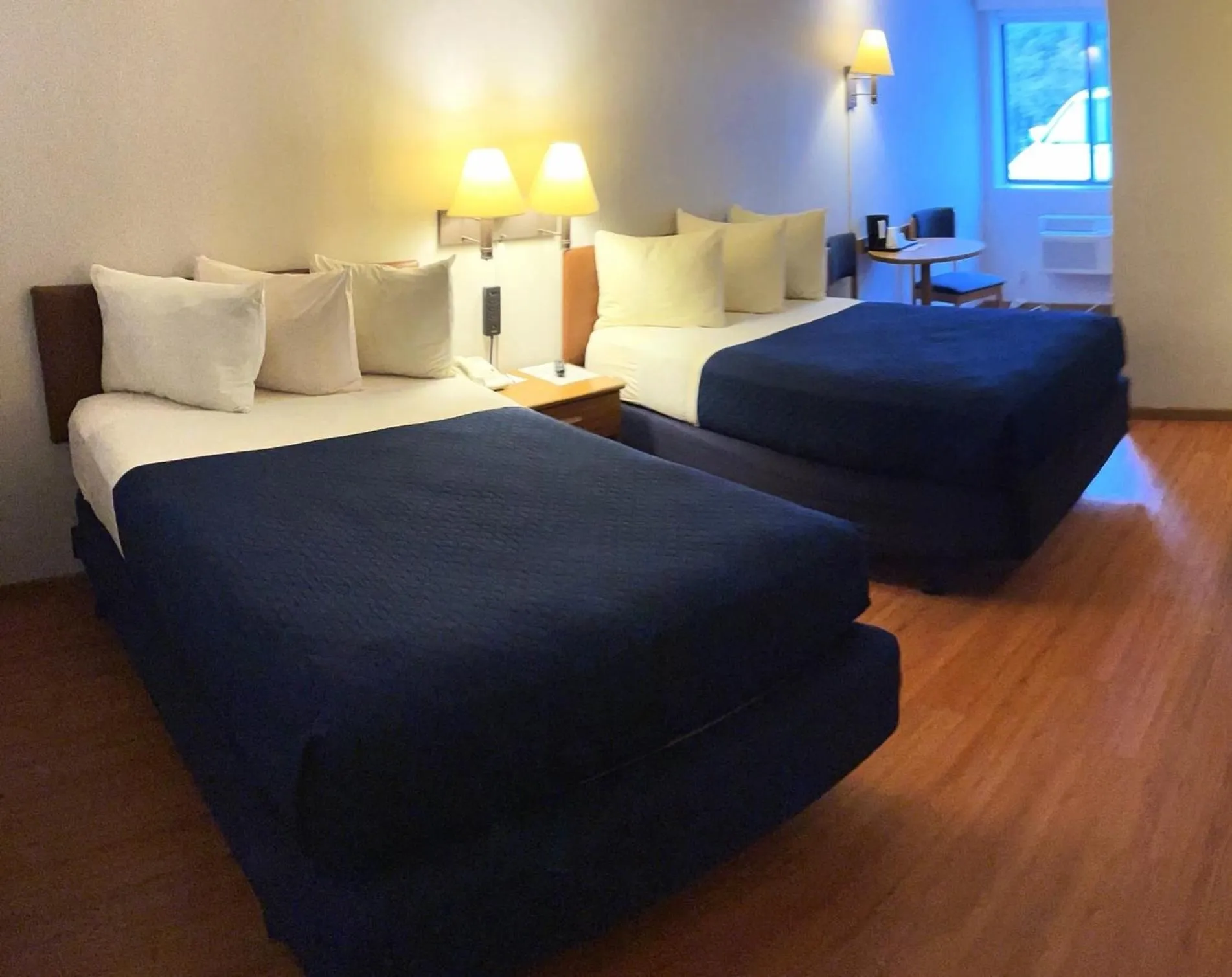 Bed in Village Inn on the Lake