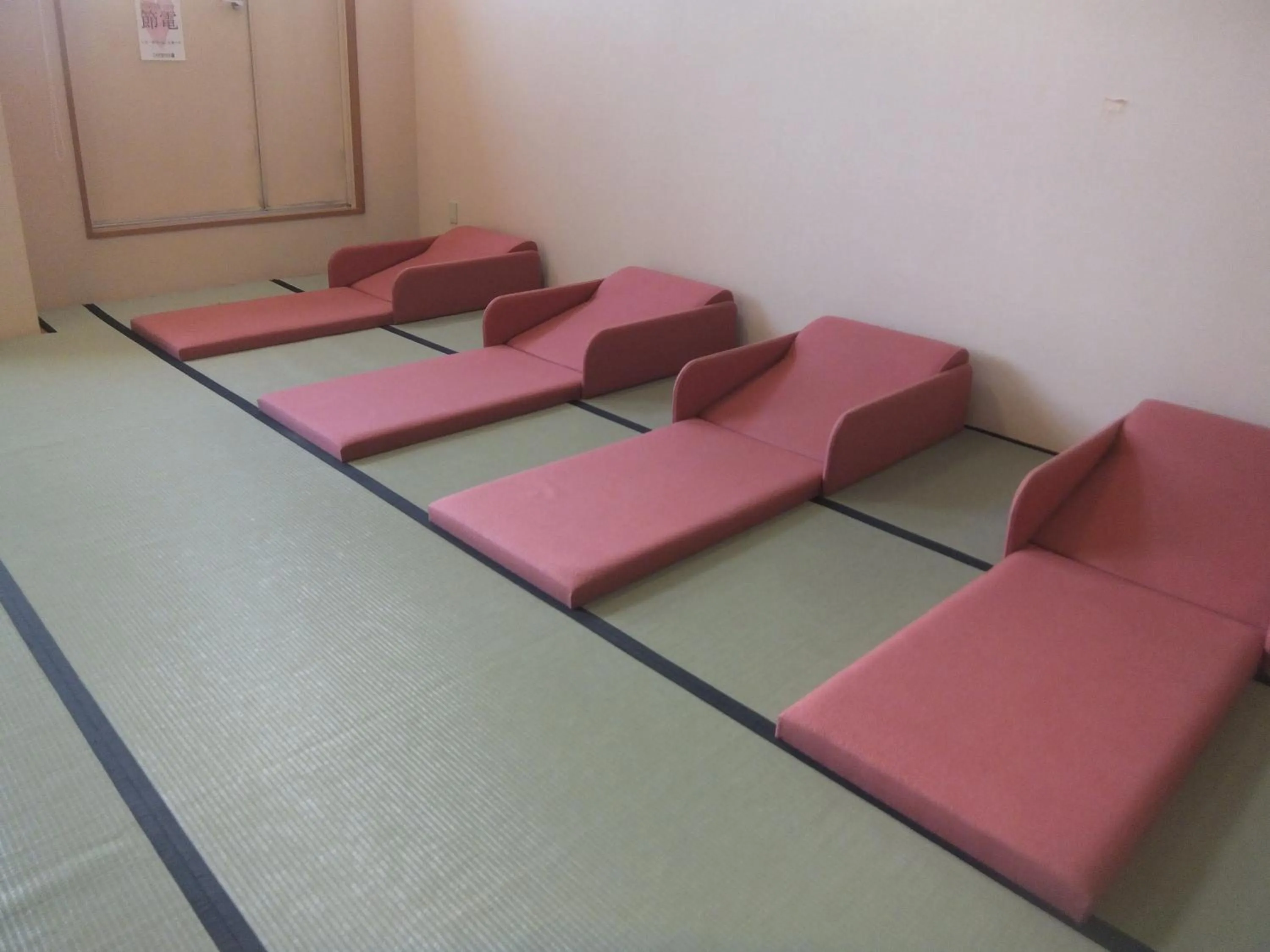 Bed in Natural Onsen Hostel Hidamari no Yu