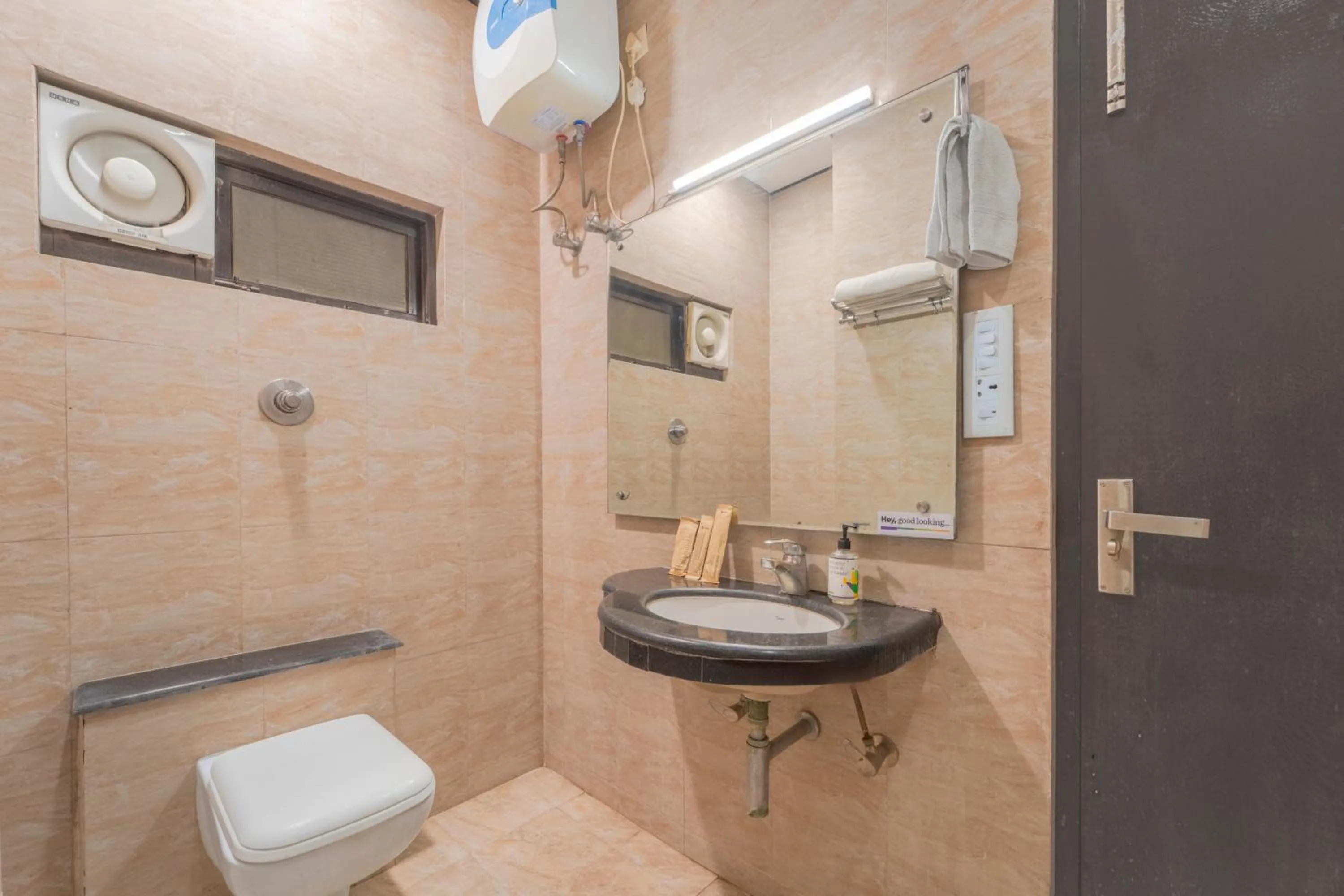 Bathroom in Treebo Shivam Inn Near Singapore Mall