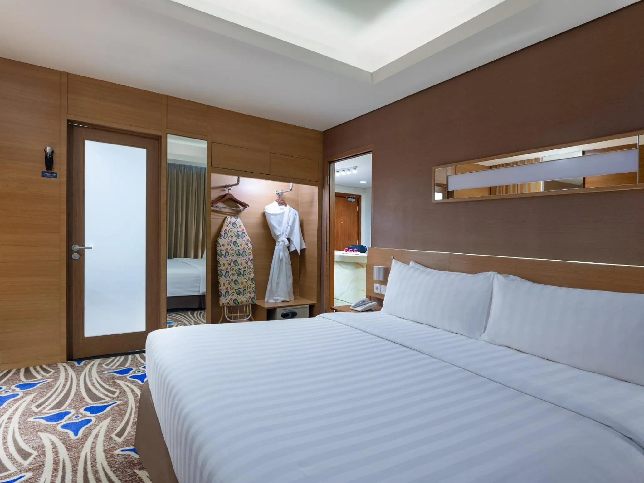 Bed in Aston Solo Hotel