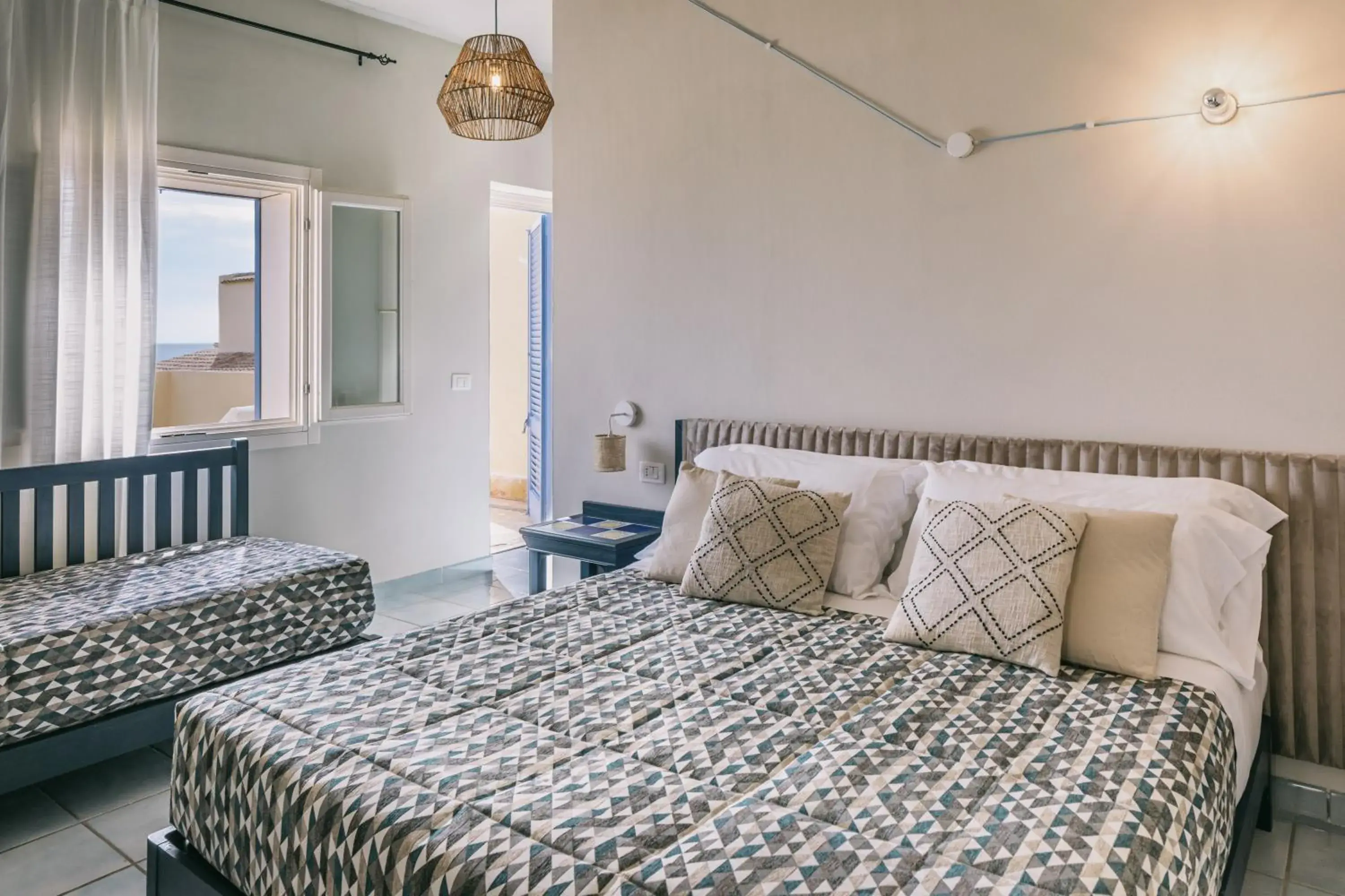 Deluxe Triple Room with Sea View in Mangia's Favignana Resort Deluxe Triple Room with Sea View in Mangia's Favignana Resort