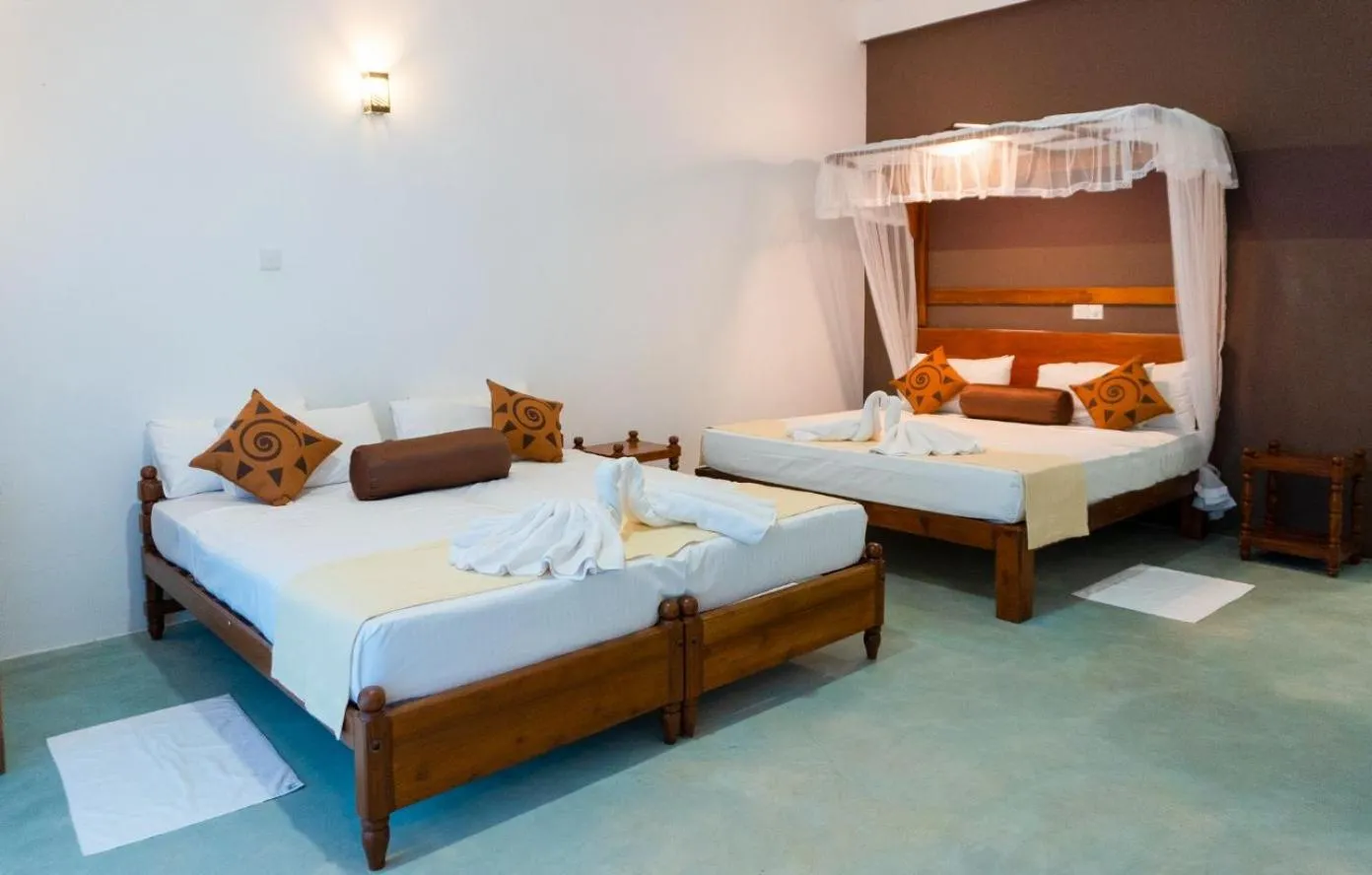 Bed in Sigiriya Cottage