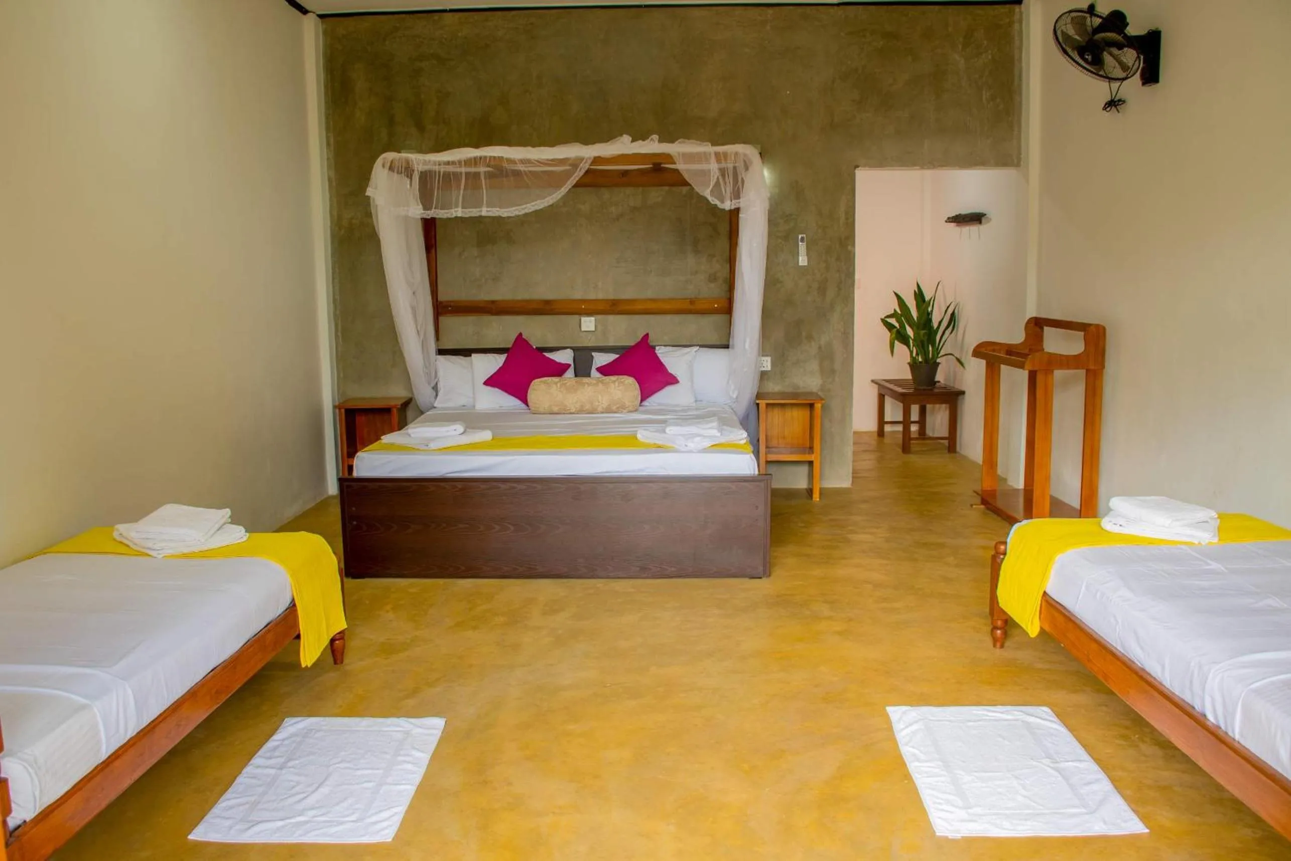 Bed in Sigiriya Cottage