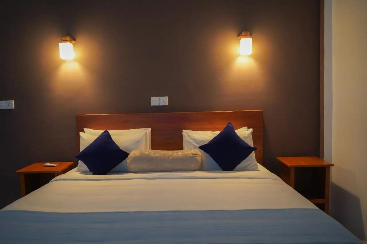 Bed in Sigiriya Cottage