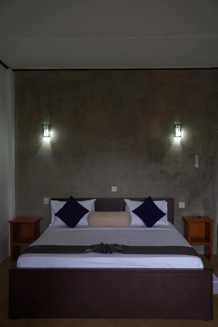 Bed in Sigiriya Cottage