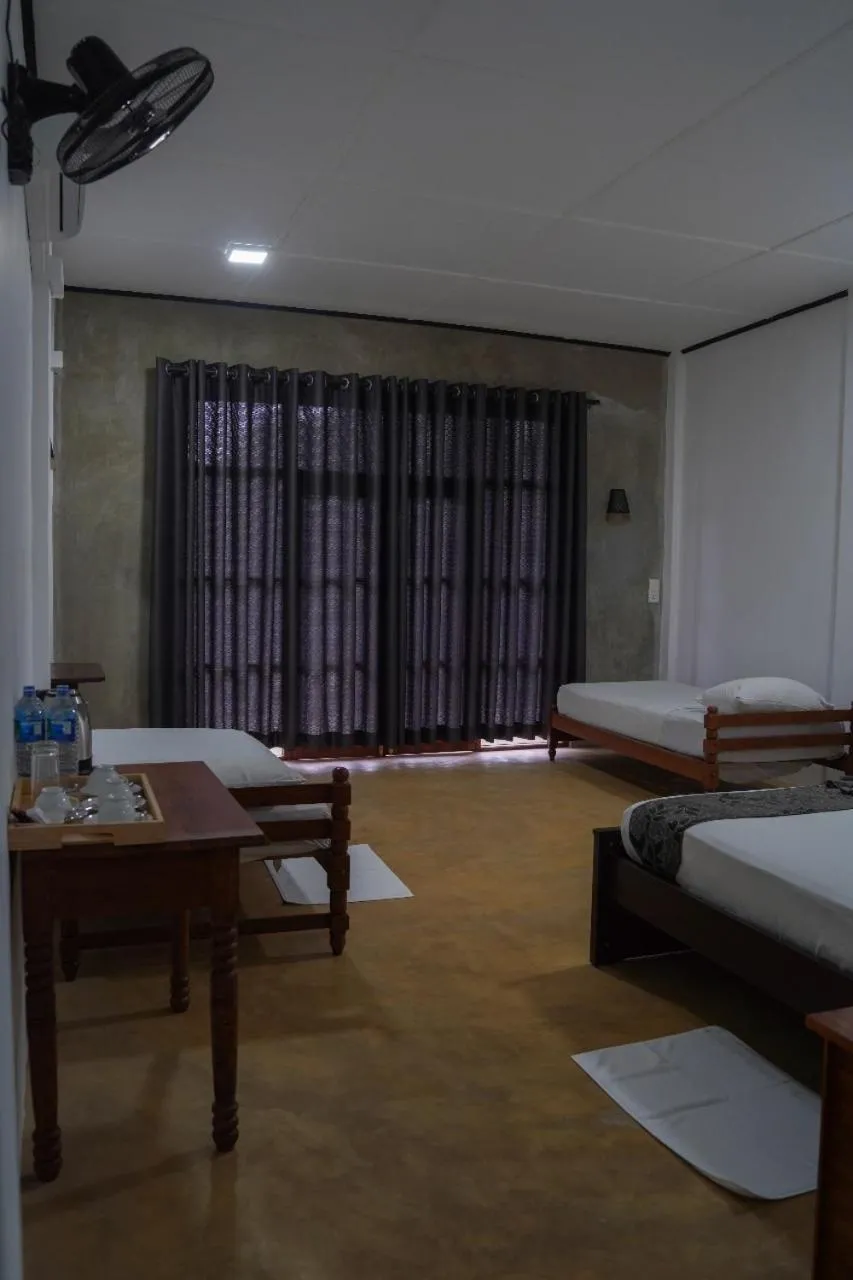 Bed in Sigiriya Cottage