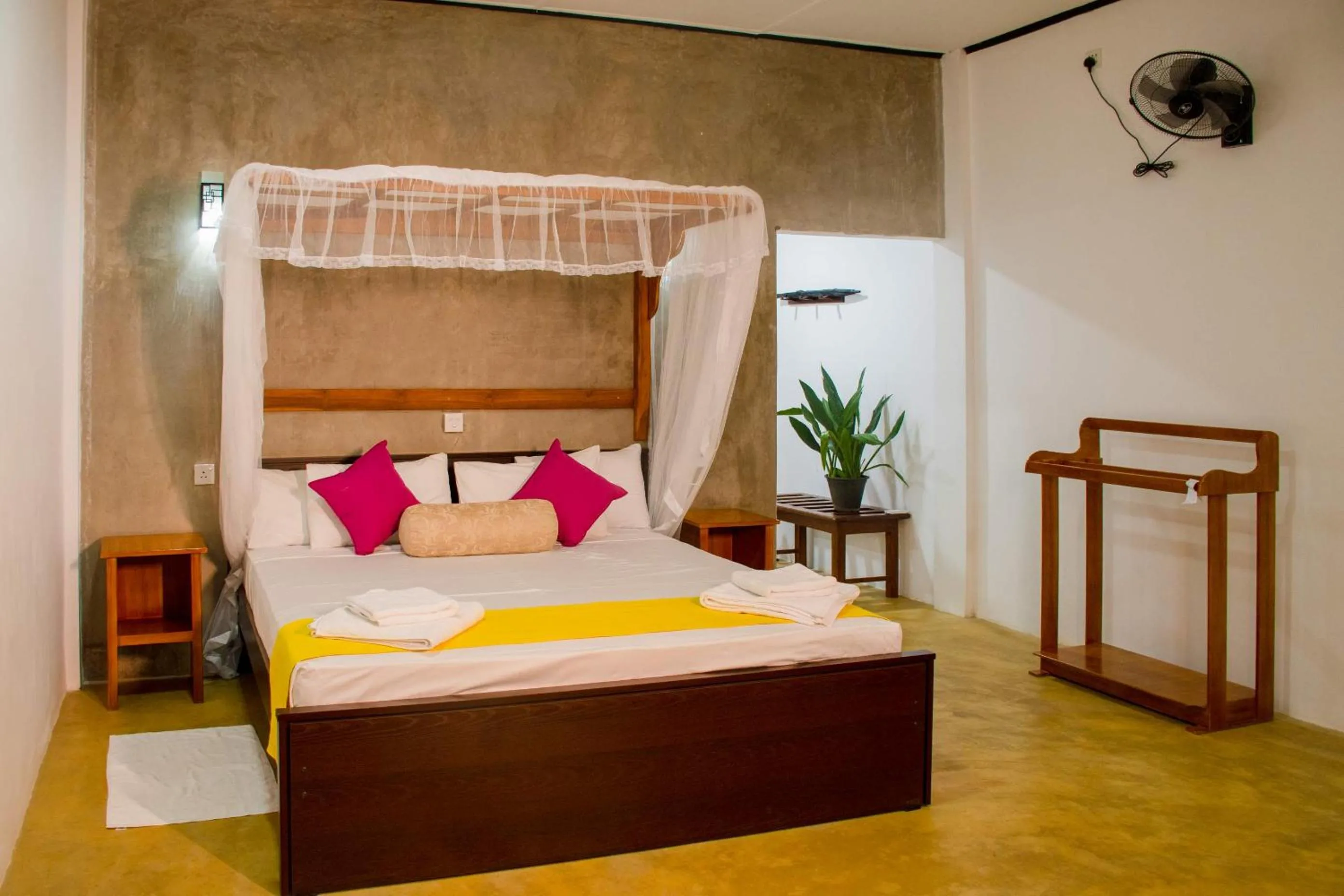 Bed in Sigiriya Cottage