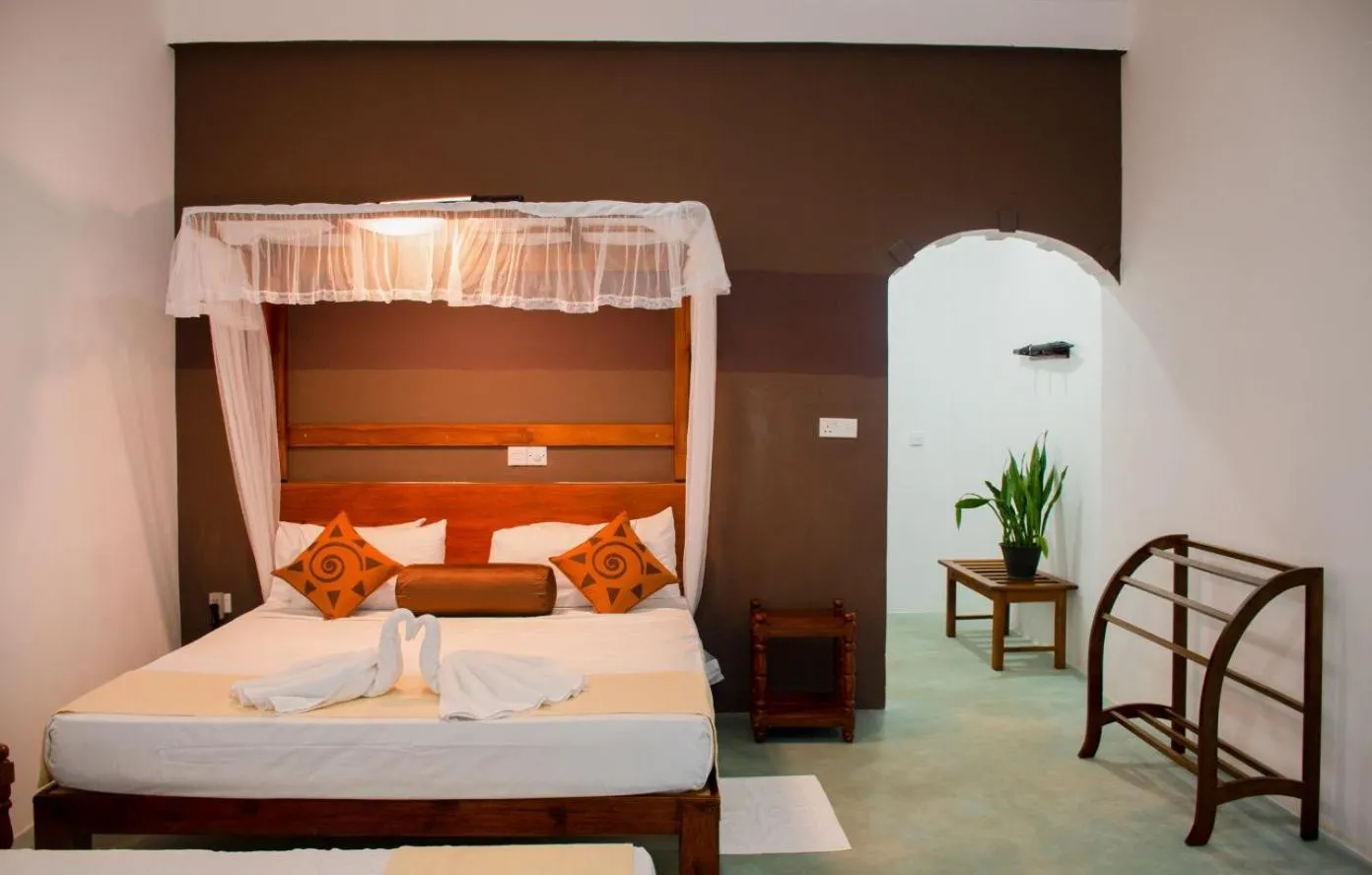 Bed in Sigiriya Cottage