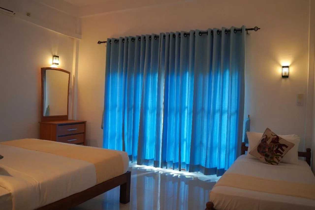 Bed in Sigiriya Cottage