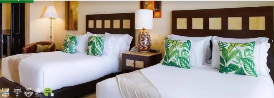 Bed in GARZA BLANCA PRESERVE RESORT & SPA